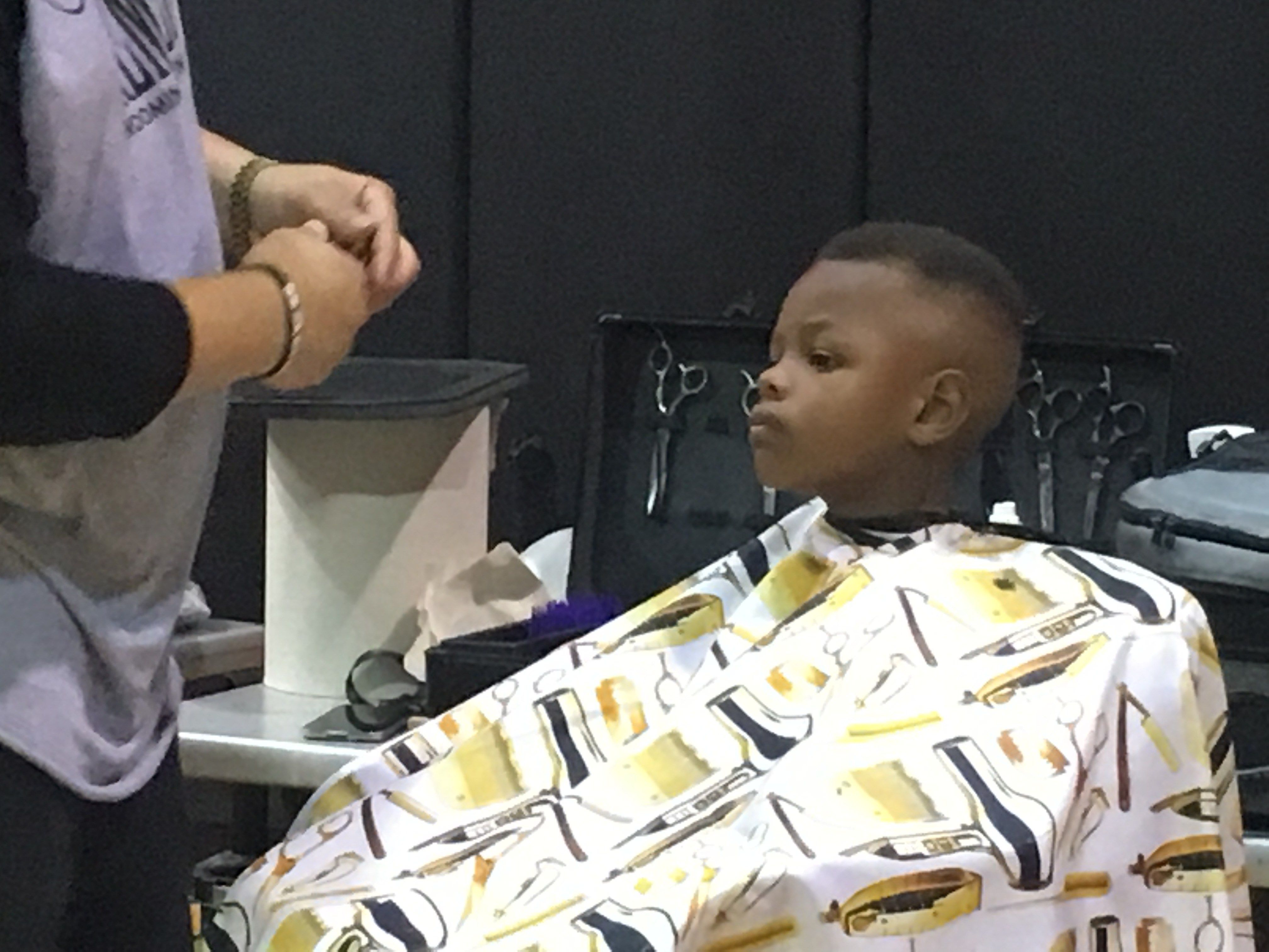 Deer Park barber gives 100 kids free haircut for first day of school