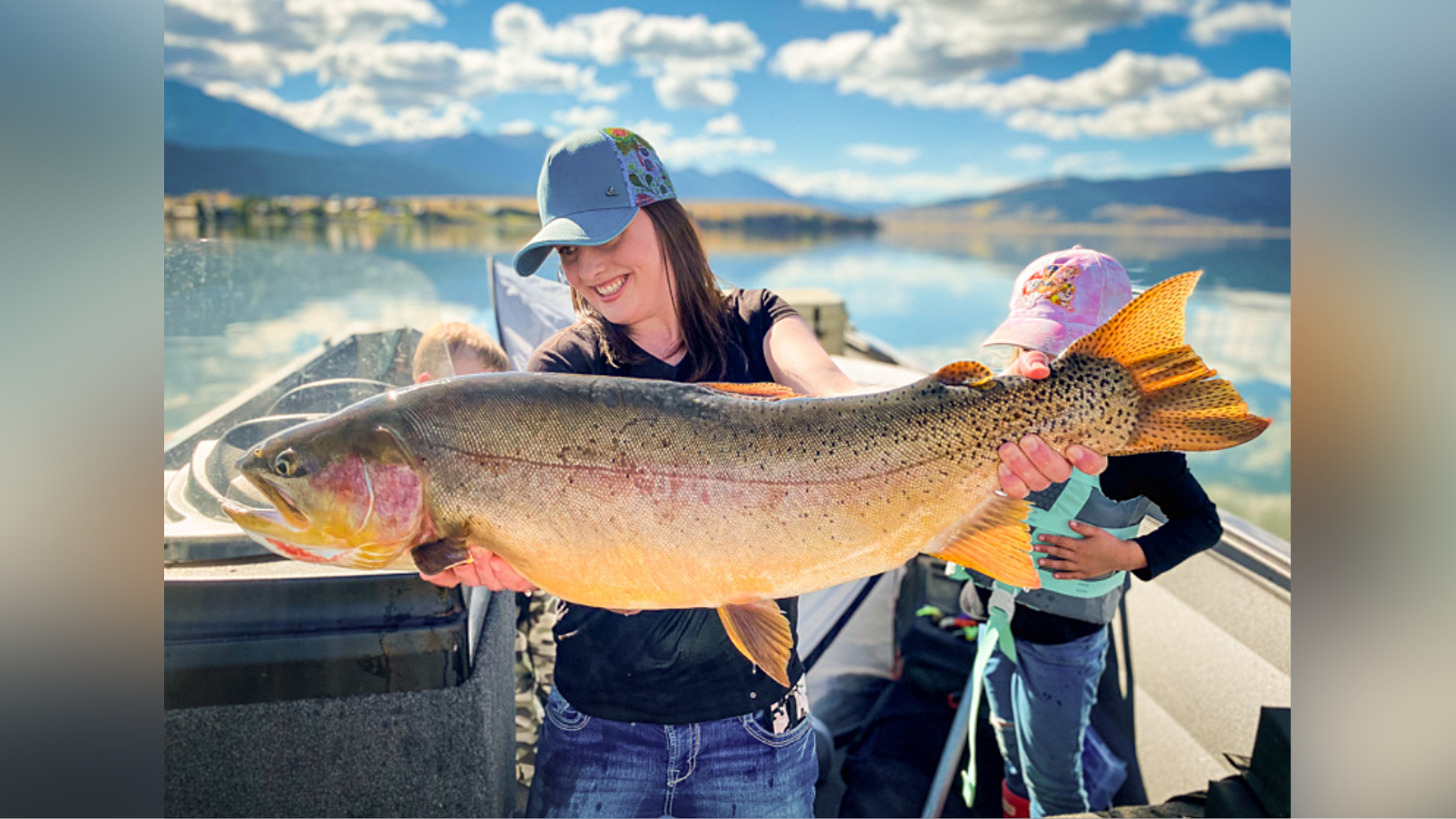 Angler sets state record with 'monster' hybrid trout