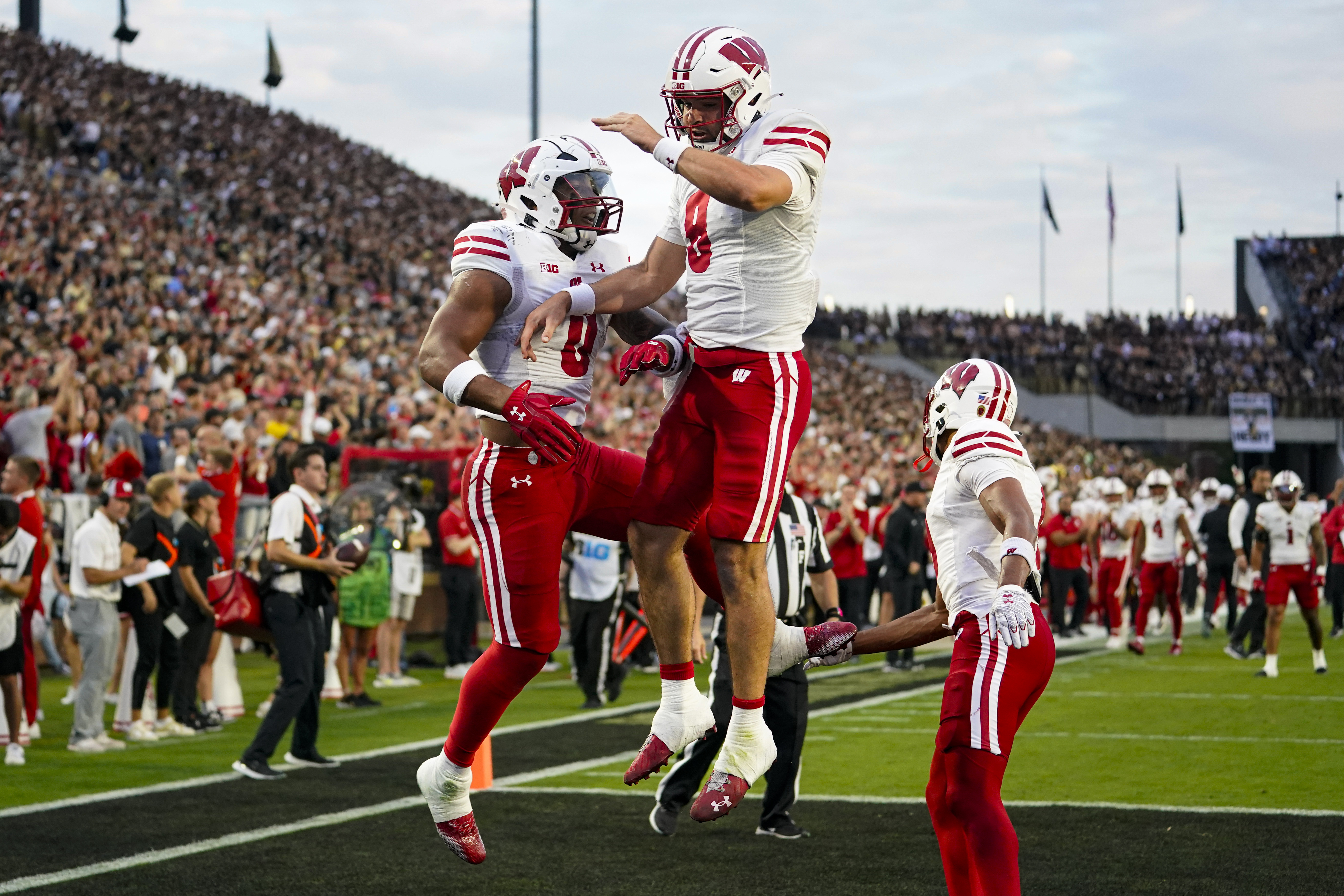 What channel is the Wisconsin football game on today vs. Oklahoma