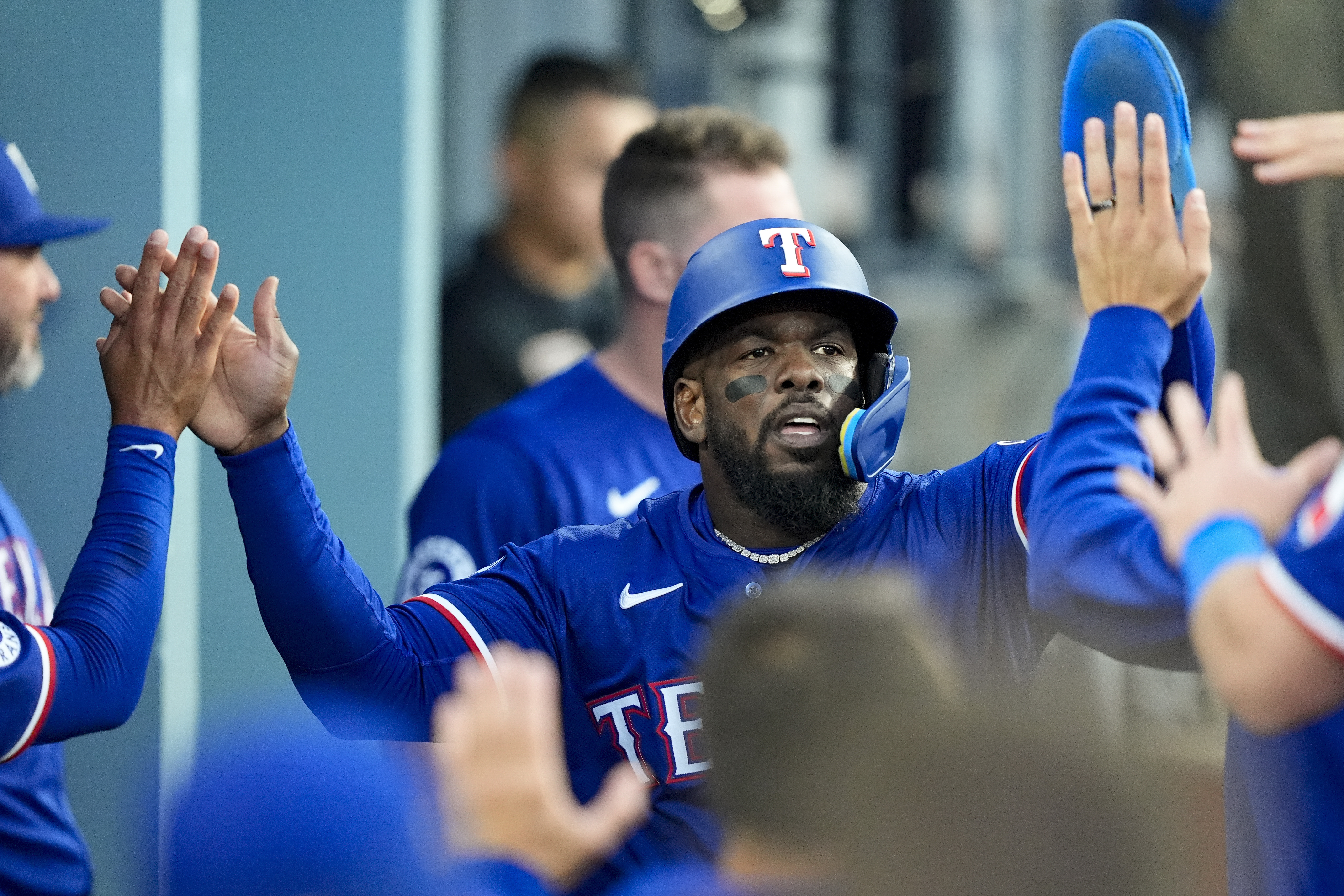 Lorenzen pitches Rangers past Dodgers 3-1 for their 1st series win