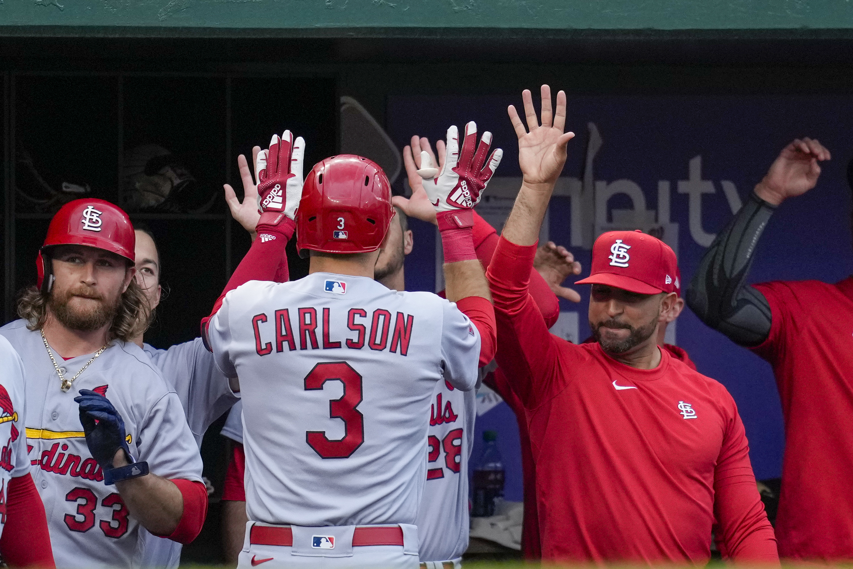 Carlson homers twice, Mikolas gets first win in two years