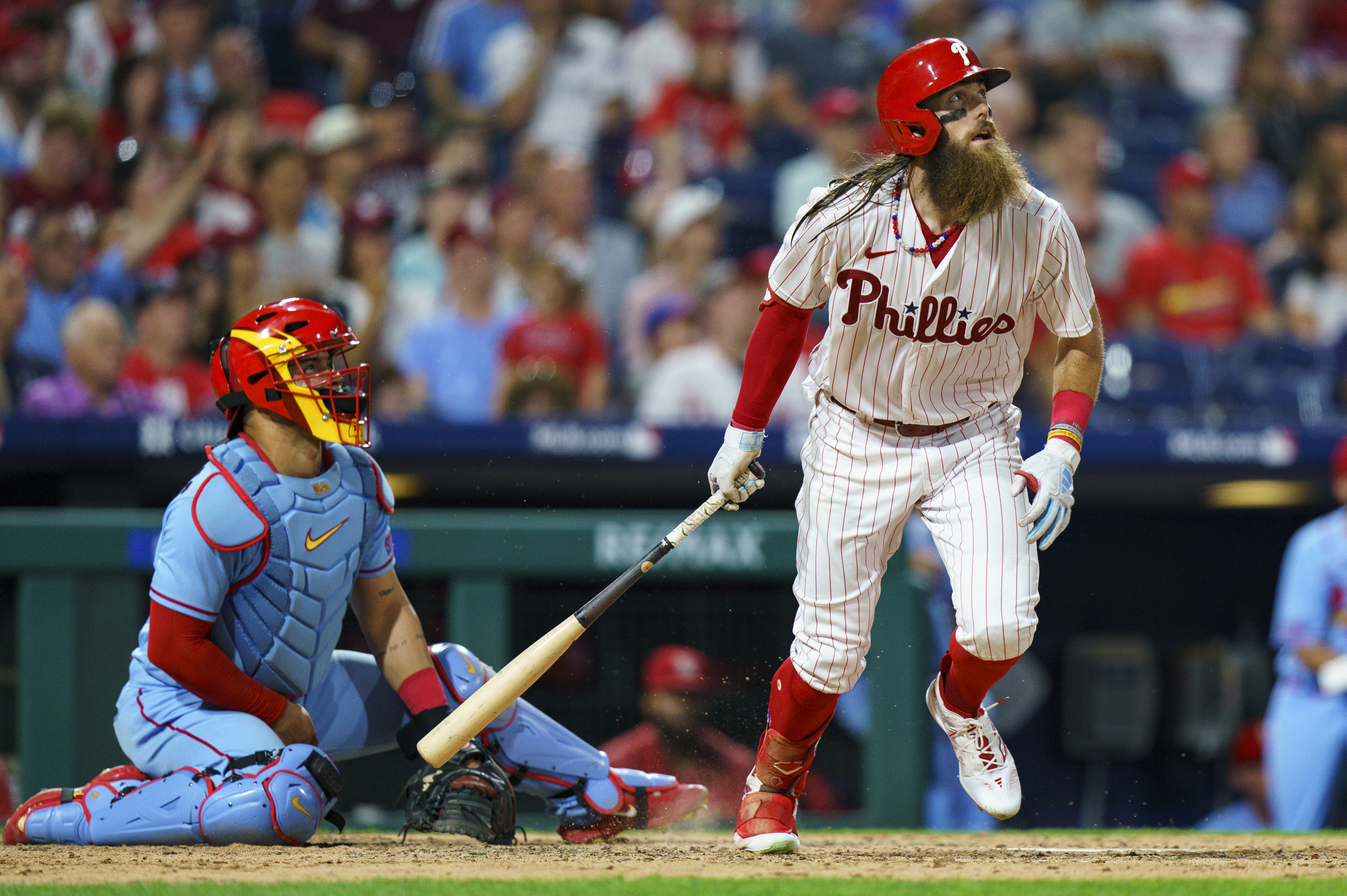Wheeler strikes out 10, Phillies hit three homers in win over