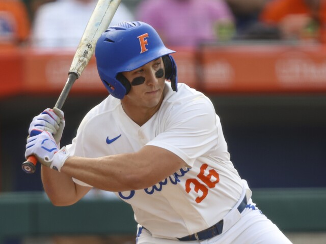 Wyatt Langford of the Florida Gators rounds the bases after