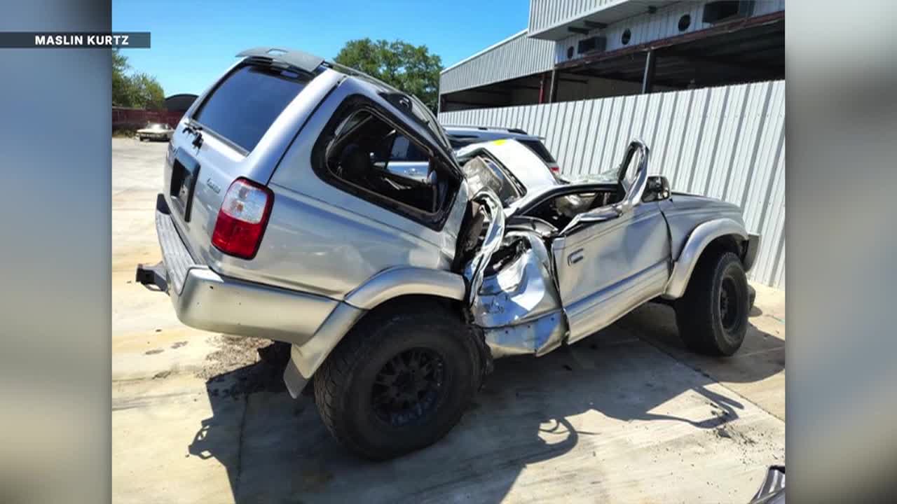 Woman survives rollover crash after hitting 9-foot alligator in