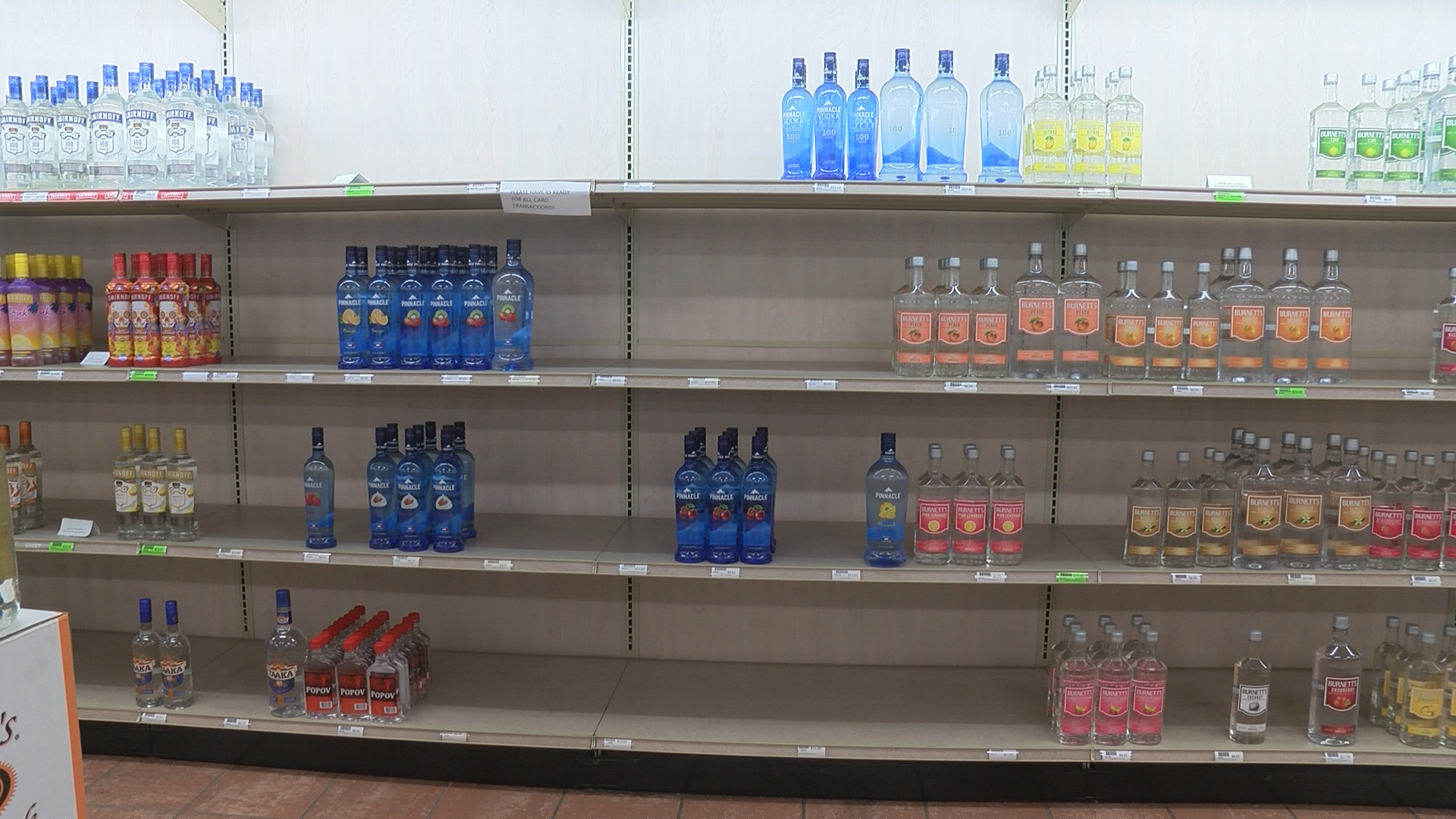 Empty shelves at liquor stores due to glass shortage