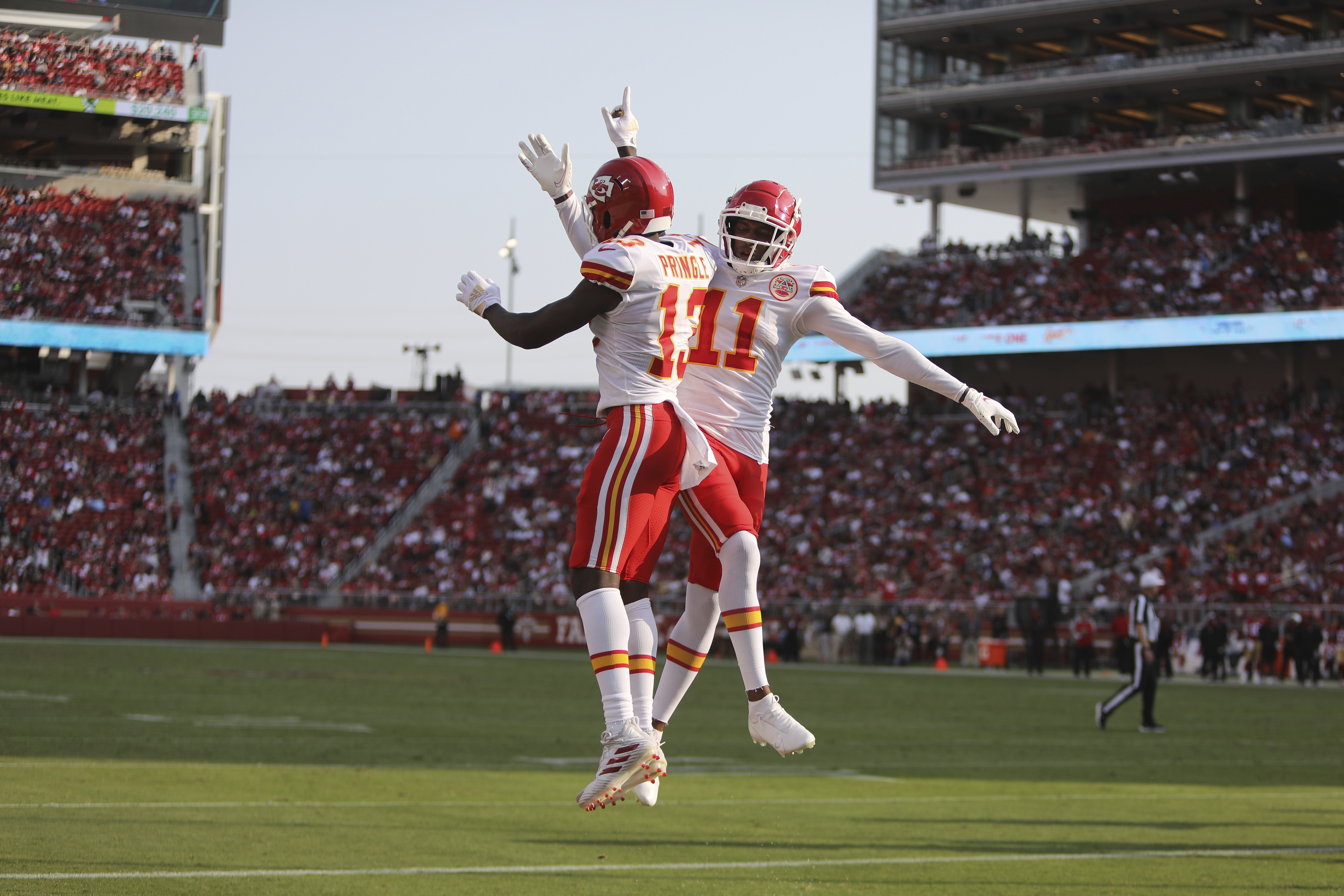 Kansas City Chiefs quarterback Shane Buechele (6) runs with the ball during  an NFL pre-season football game against the Washington Commanders Saturday,  Aug. 20, 2022, in Kansas City, Mo. (AP Photo/Peter Aiken