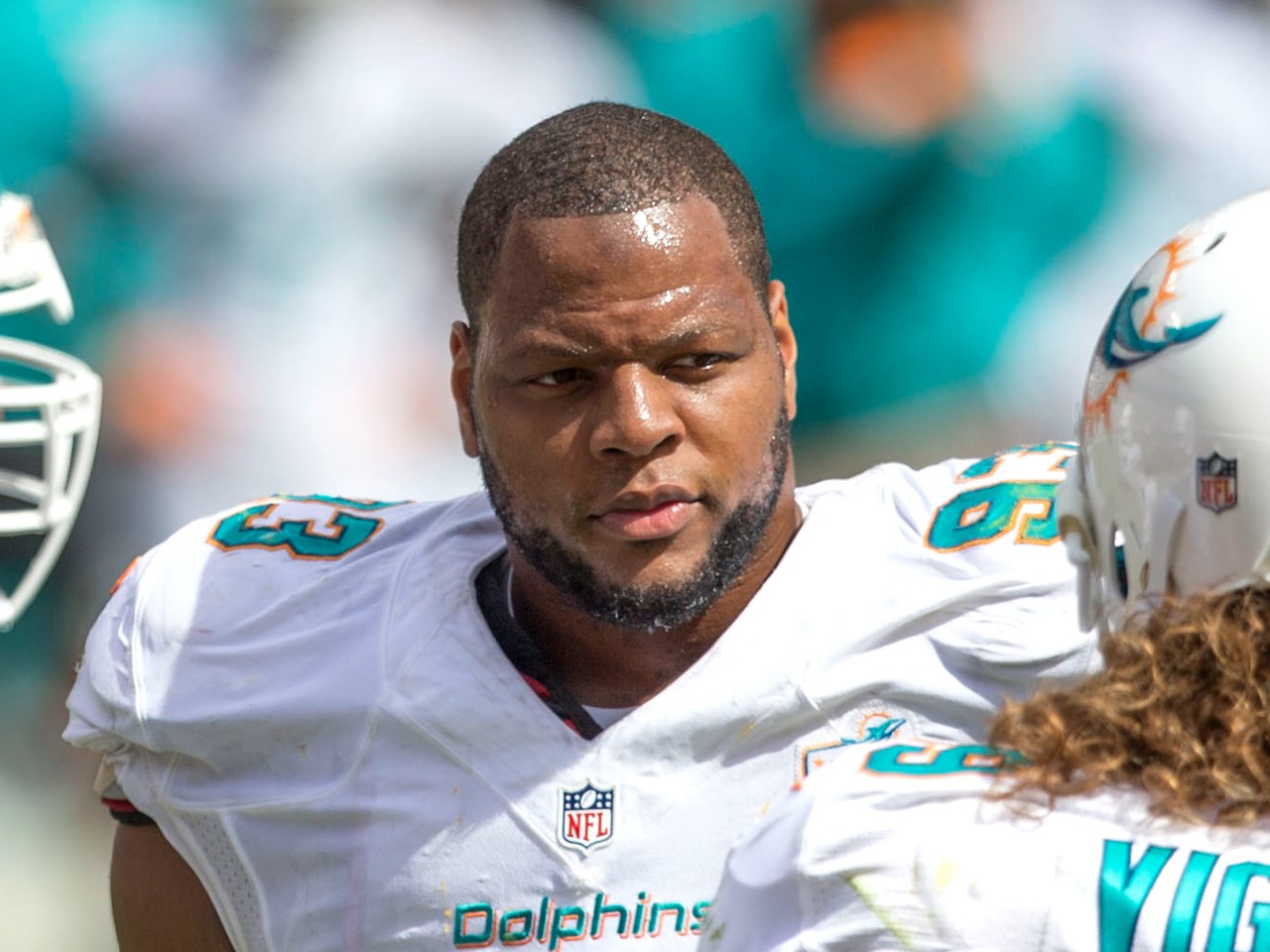 AP source: Dolphins discuss cutting ex-Lion Suh