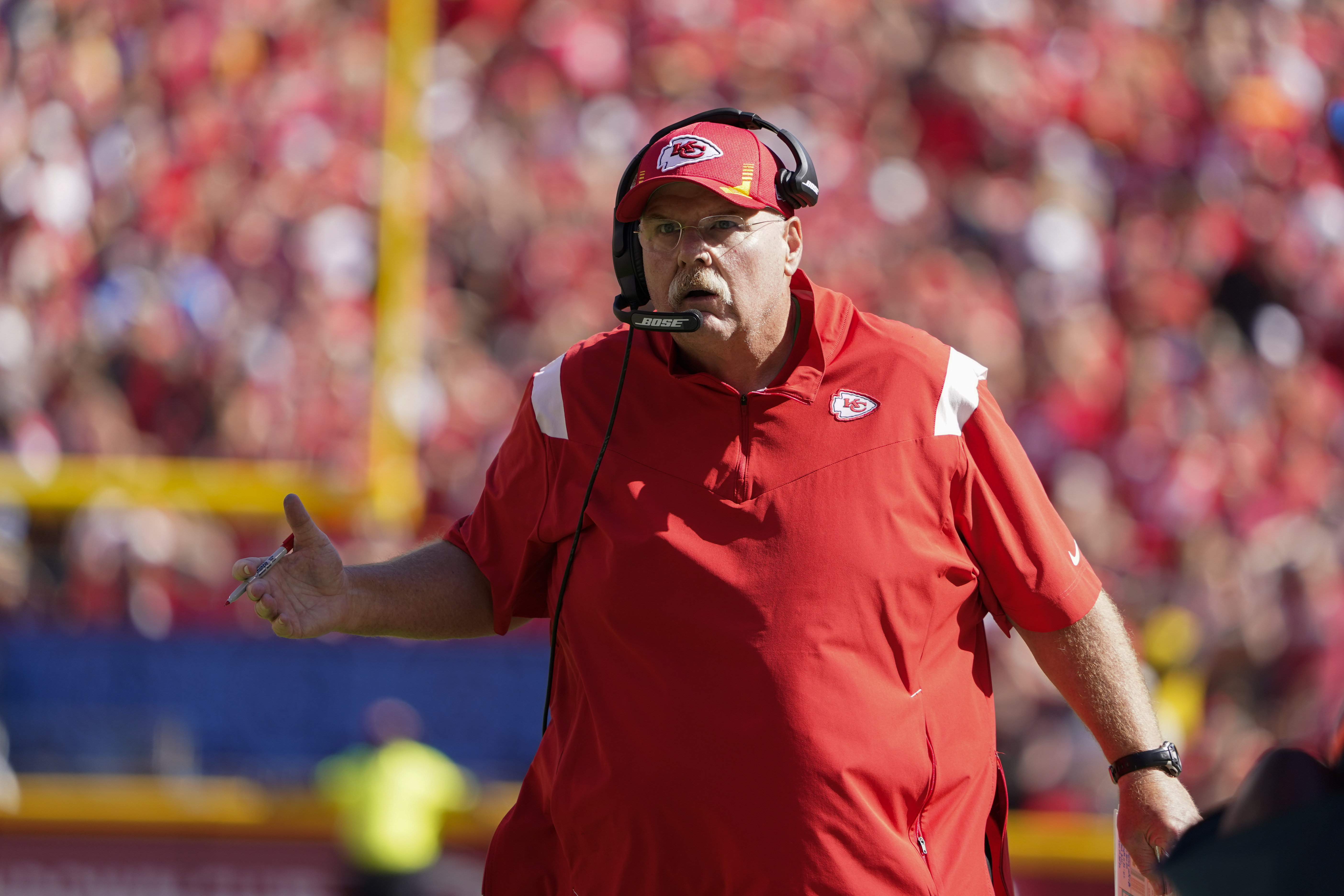 Kansas City Chiefs head coach Andy Reid watches a game replay