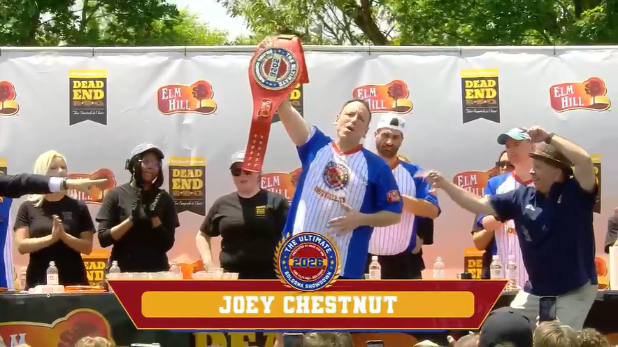 Champion eater Joey Chestnut breaks record en route to third
