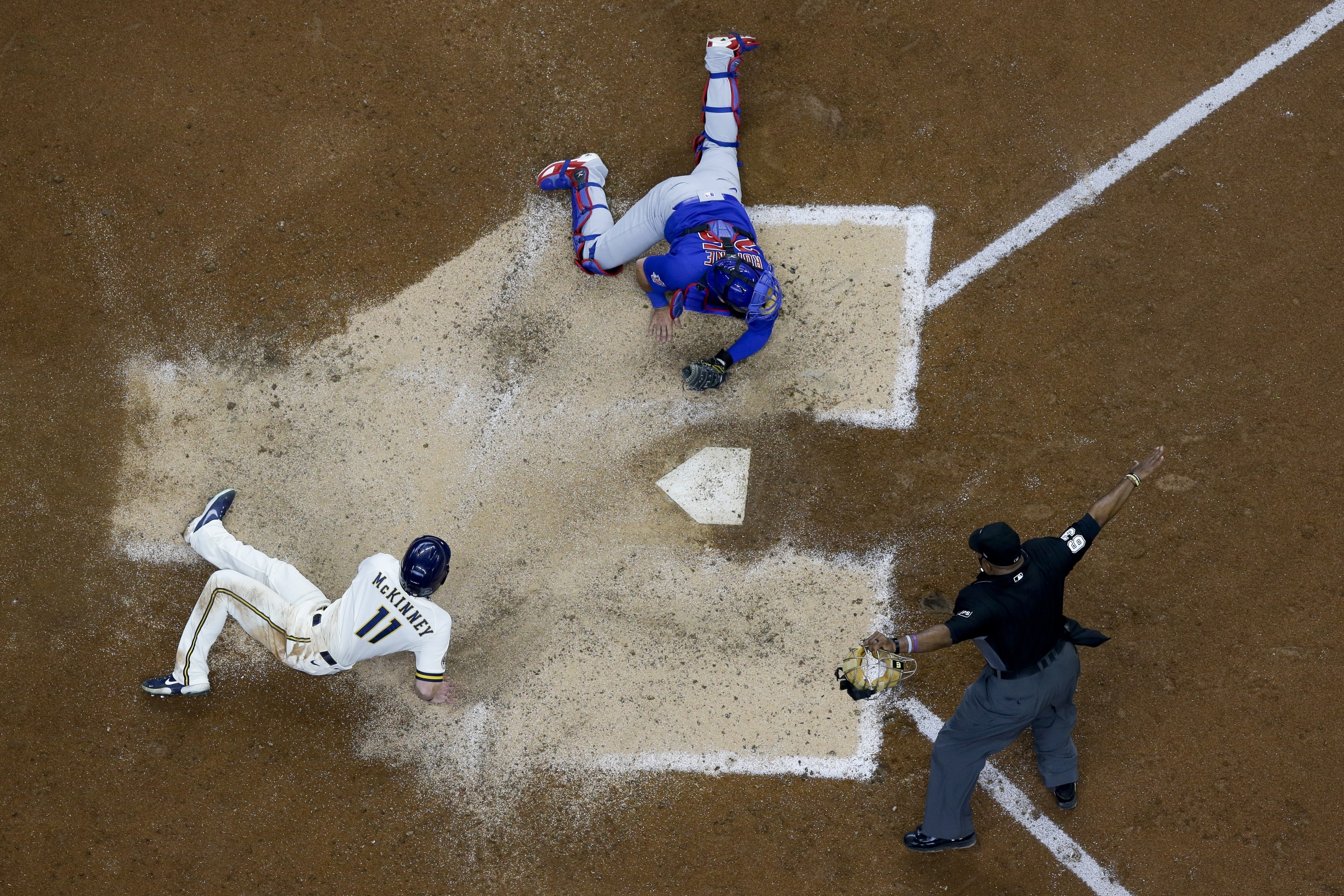 Corbin Burnes delivers with arm, bat as Brewers trounce Cubs