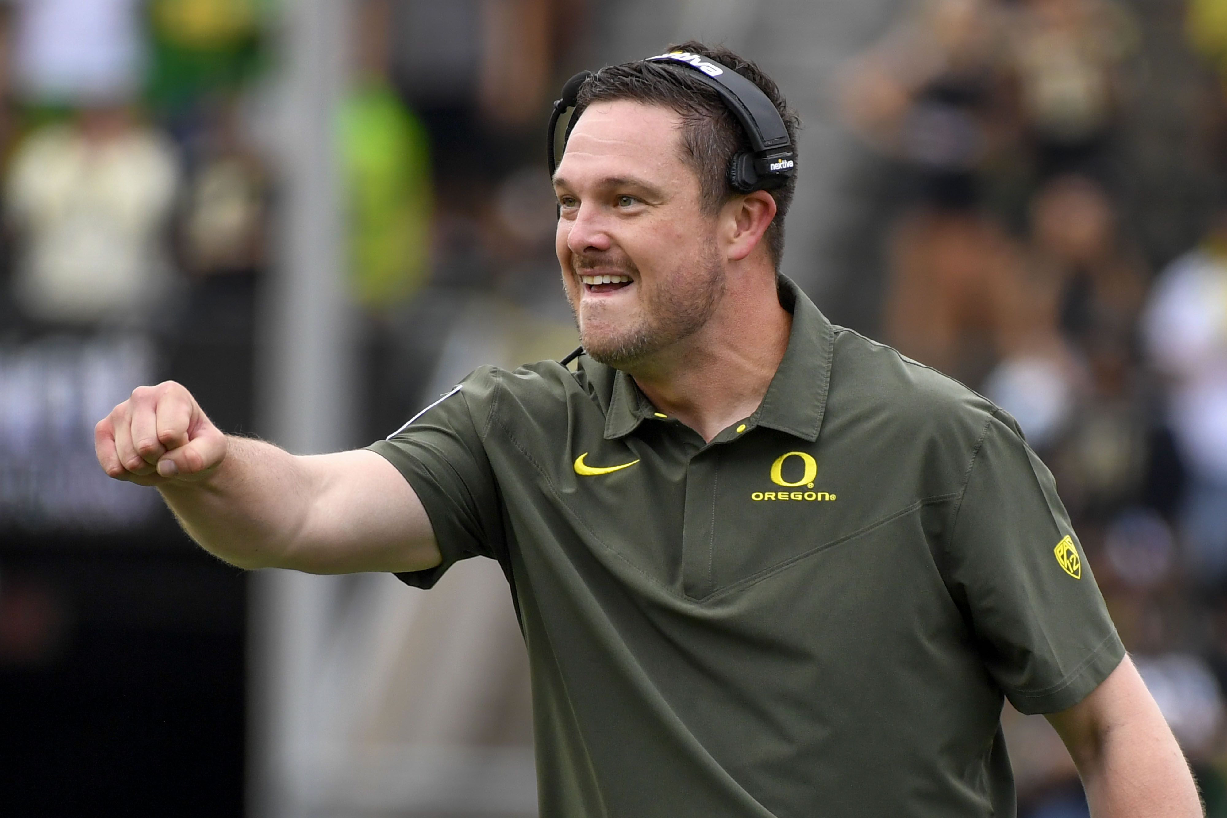 Oregon Coach Dan Lanning Values Deion Sanders' Impact on College Football