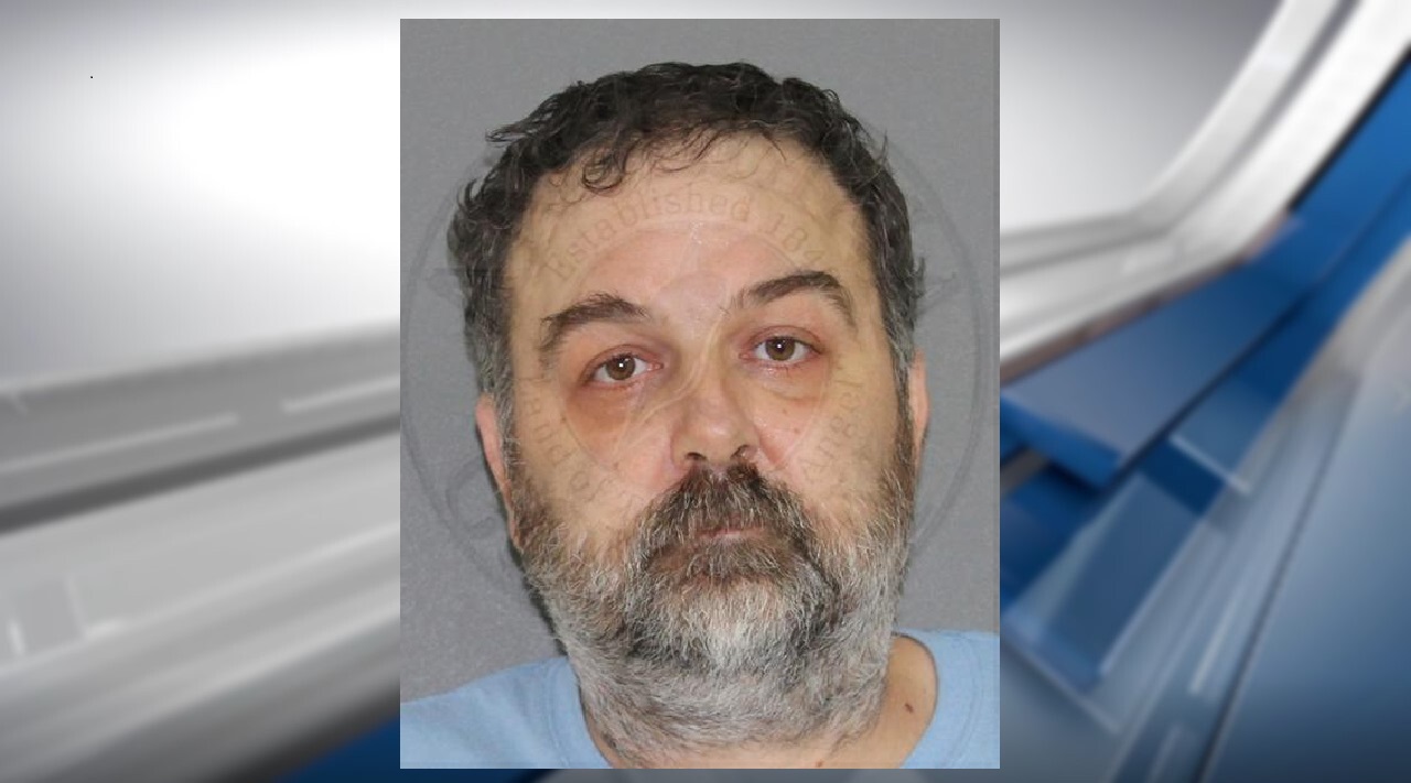 Huntington man arrested after child porn found on multiple devices