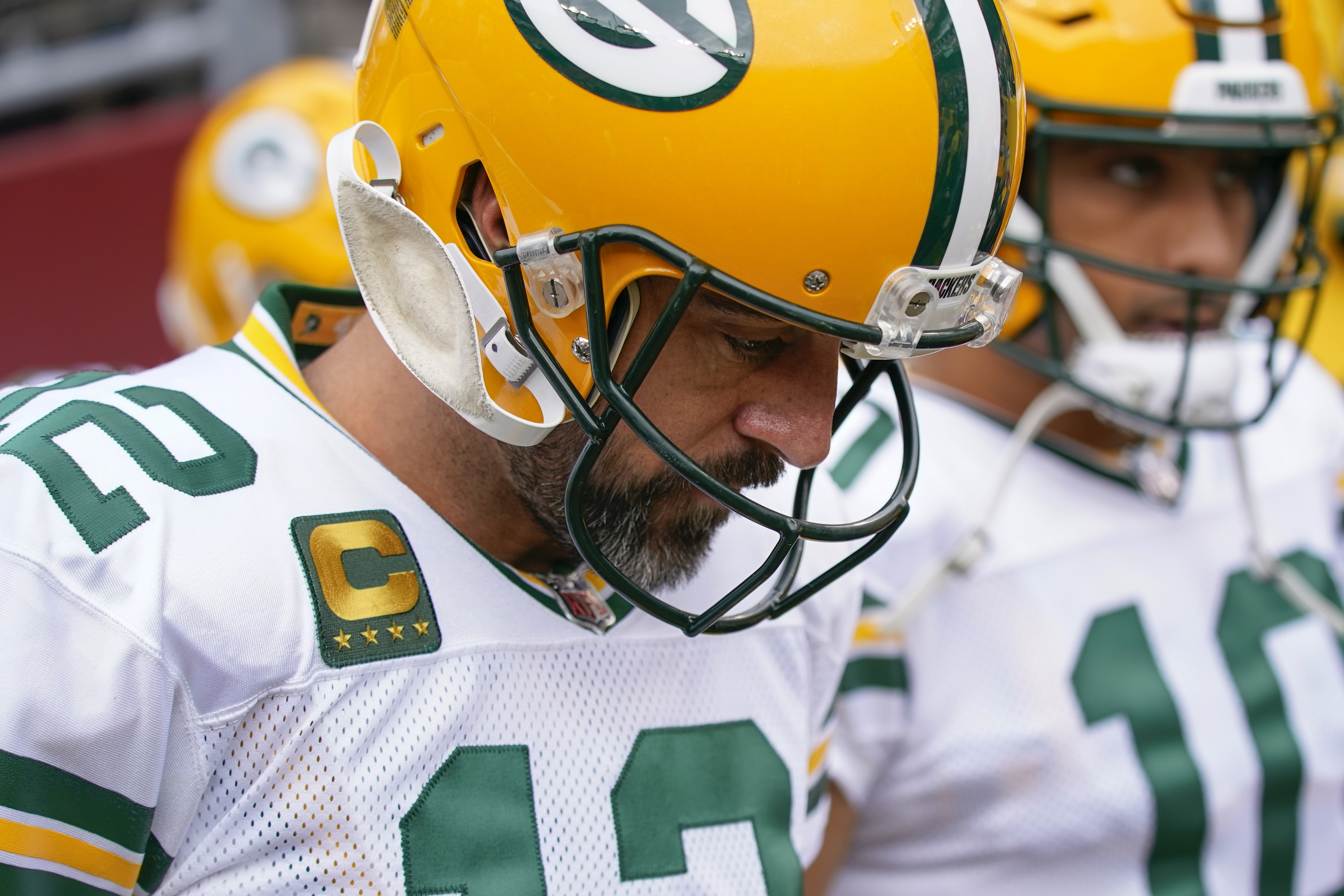 Packers' Aaron Rodgers (thumb) sits out practice