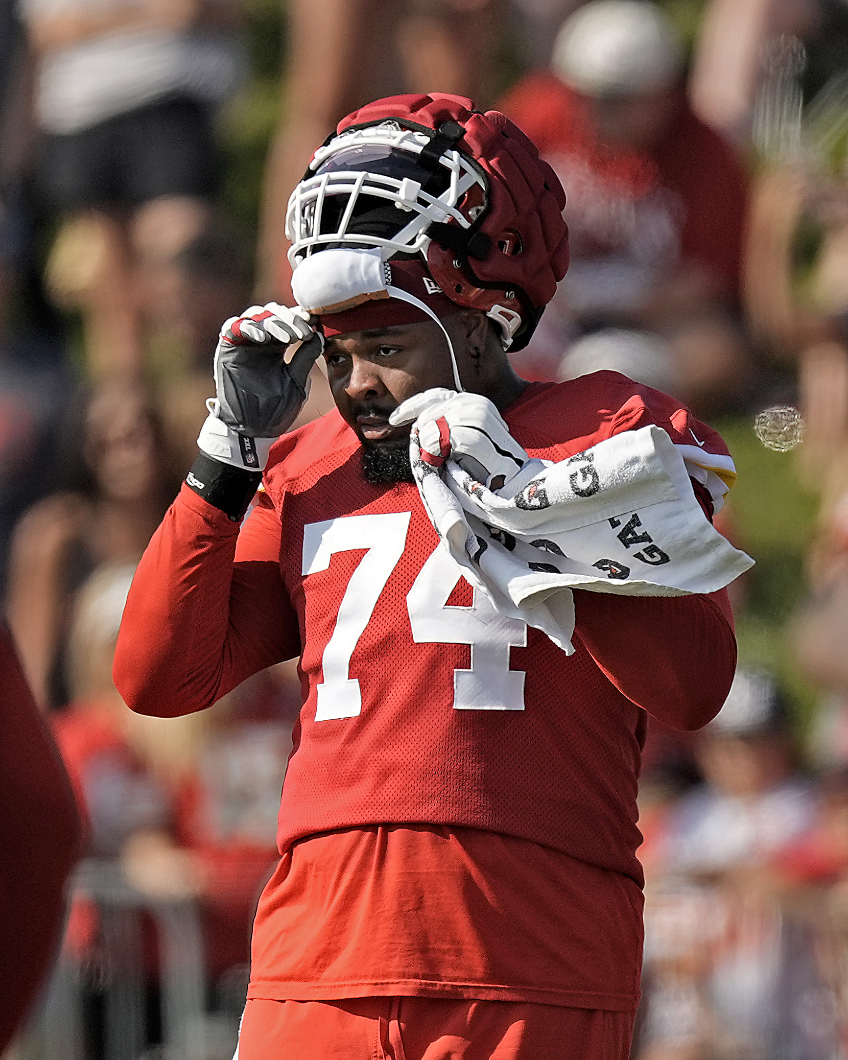 Kansas City Chiefs center Creed Humphrey (52) walks the sideline