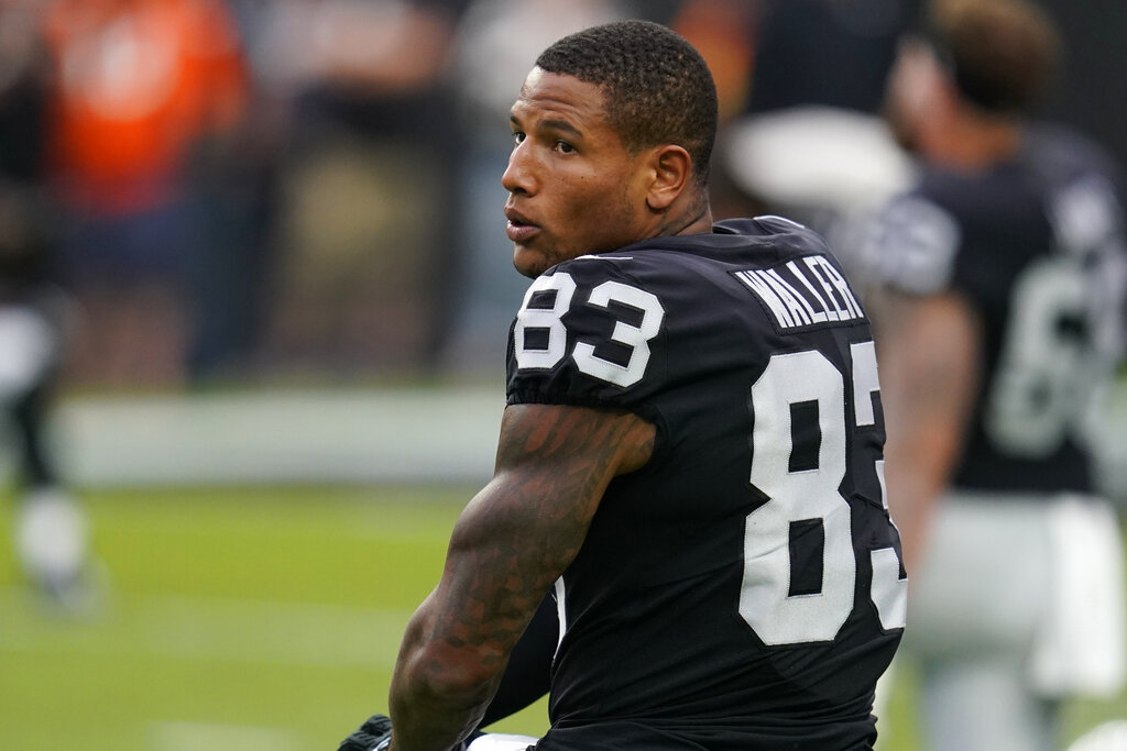 Las Vegas Raiders tight end Darren Waller warms up before the