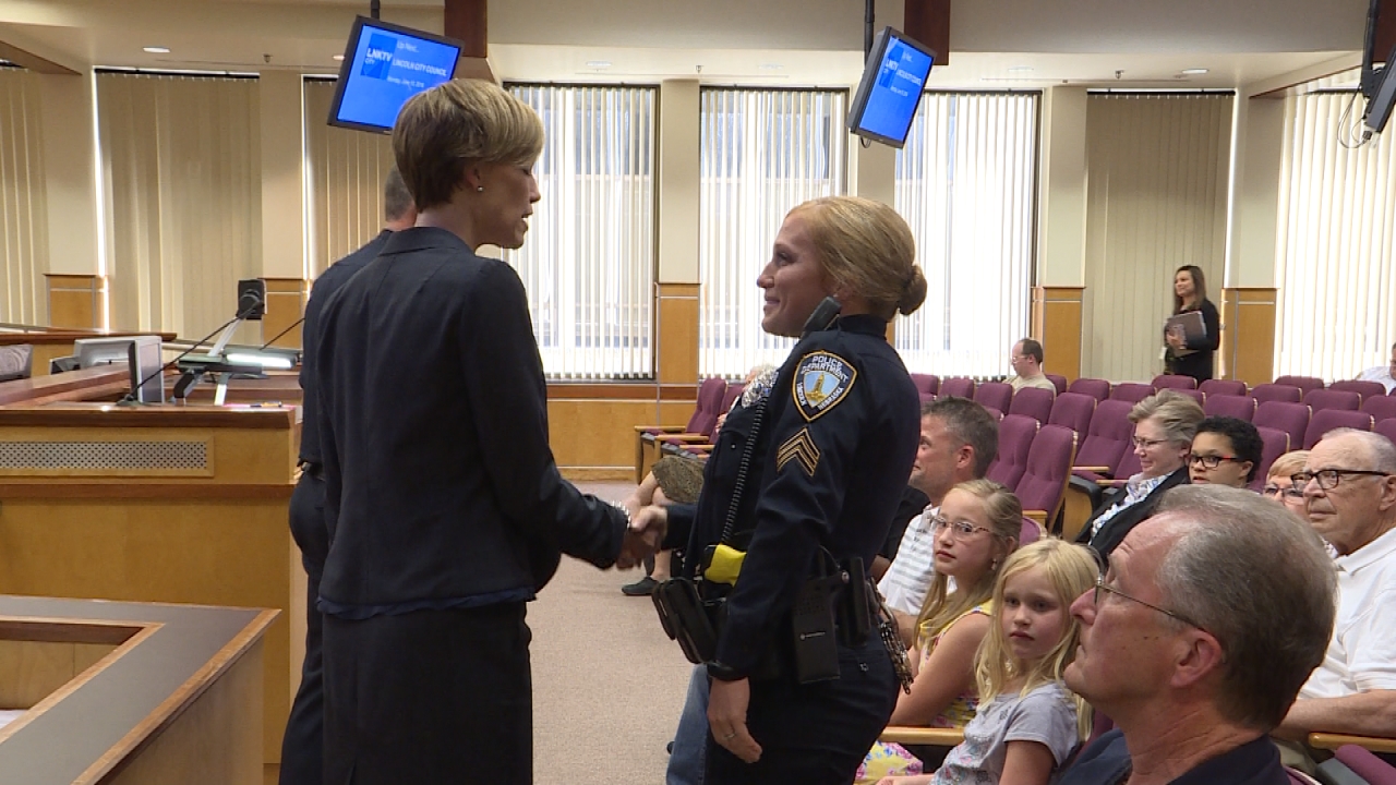 Mayor awards police officer Award of Excellence for work with