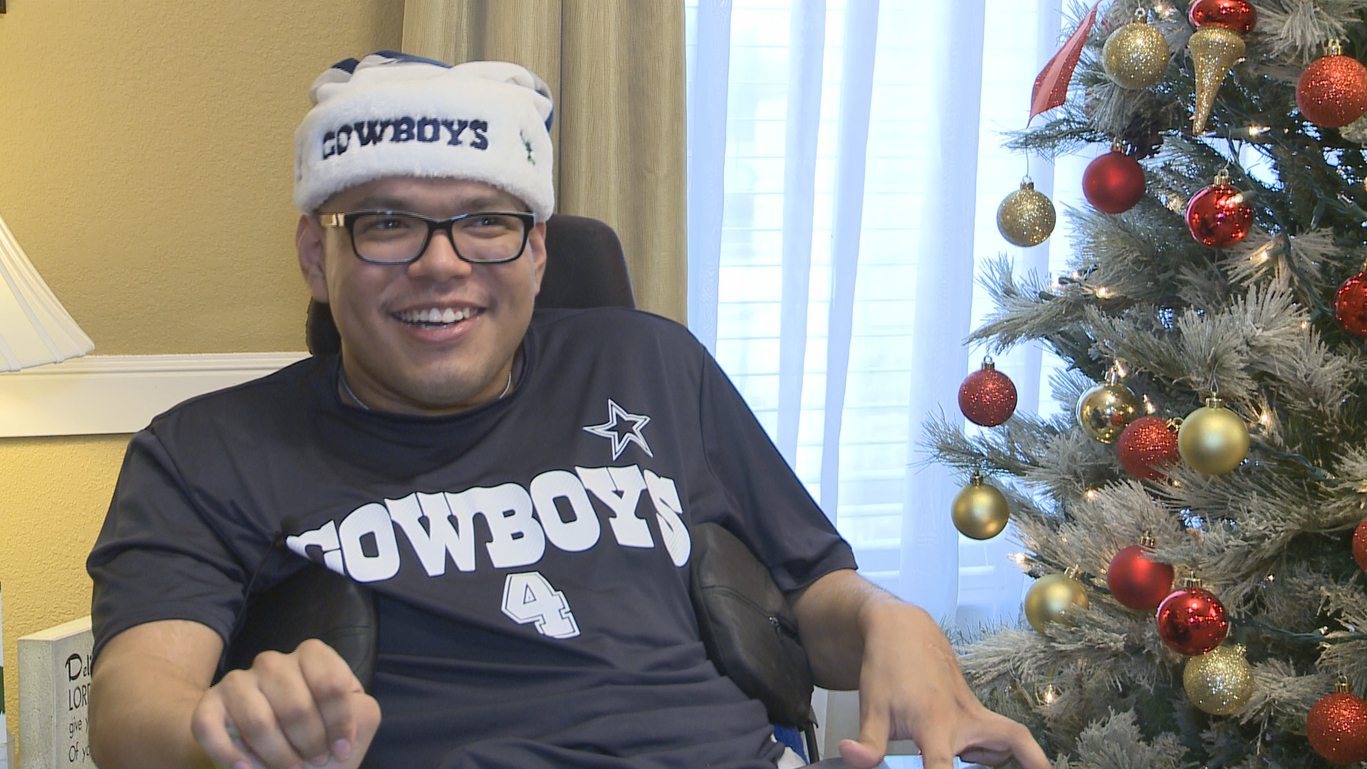 Cowboys fan living with Cerebral Palsy surprised with Christmas