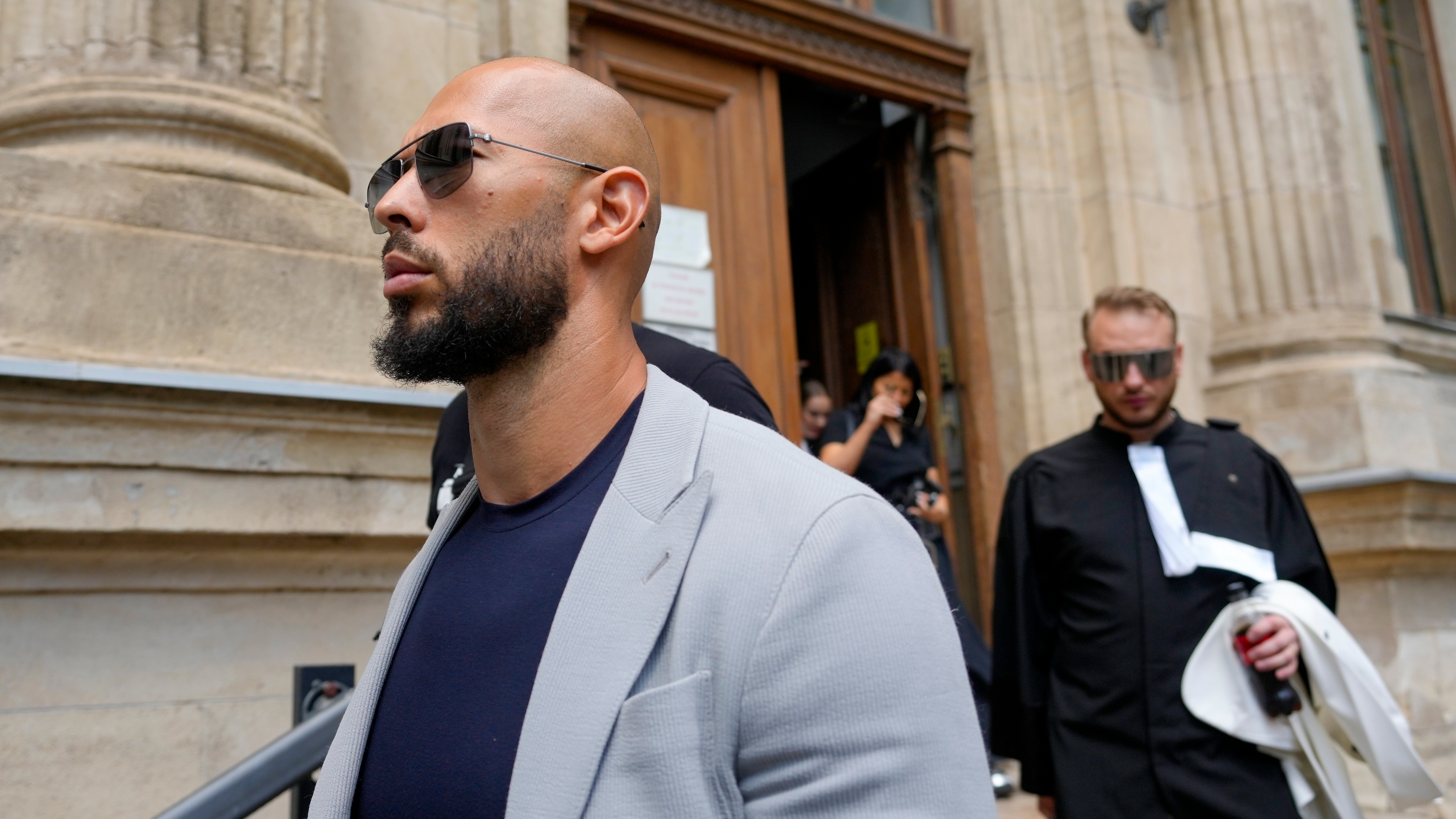 Influencer Andrew Tate released from house arrest while he awaits human  trafficking and rape trial