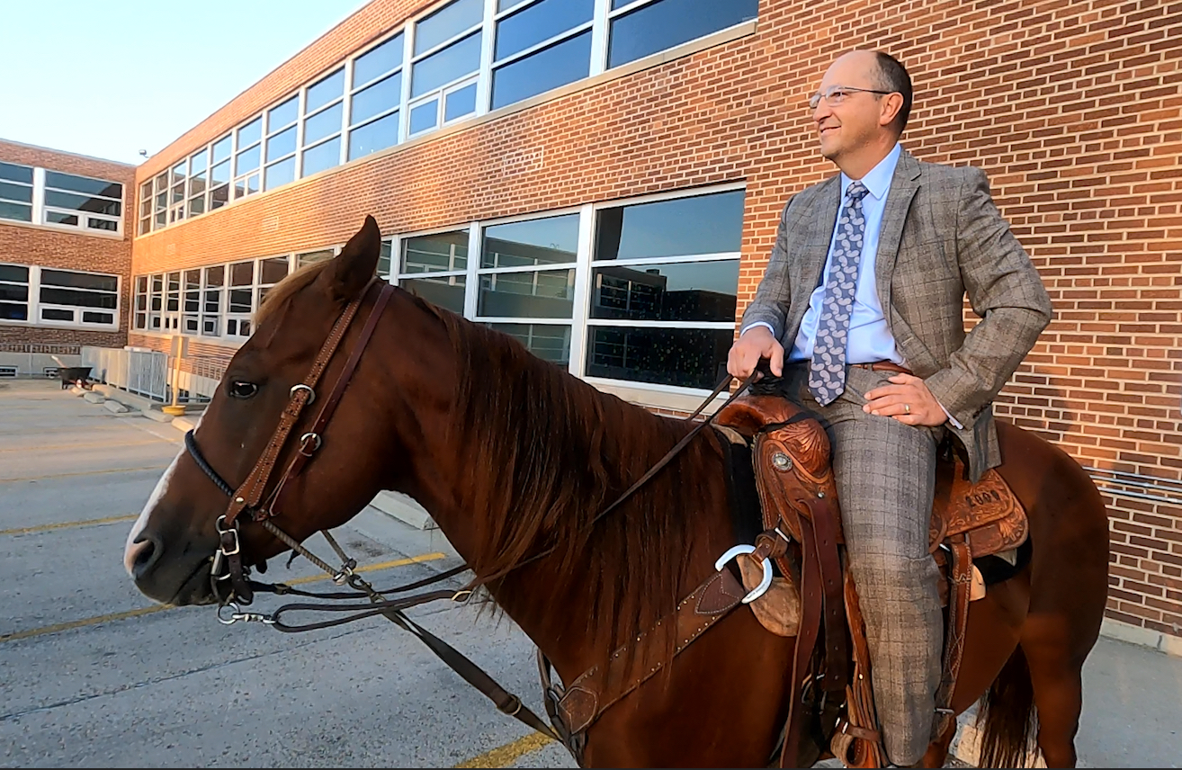 Bismarck High principal continues tradition of the maroon suit