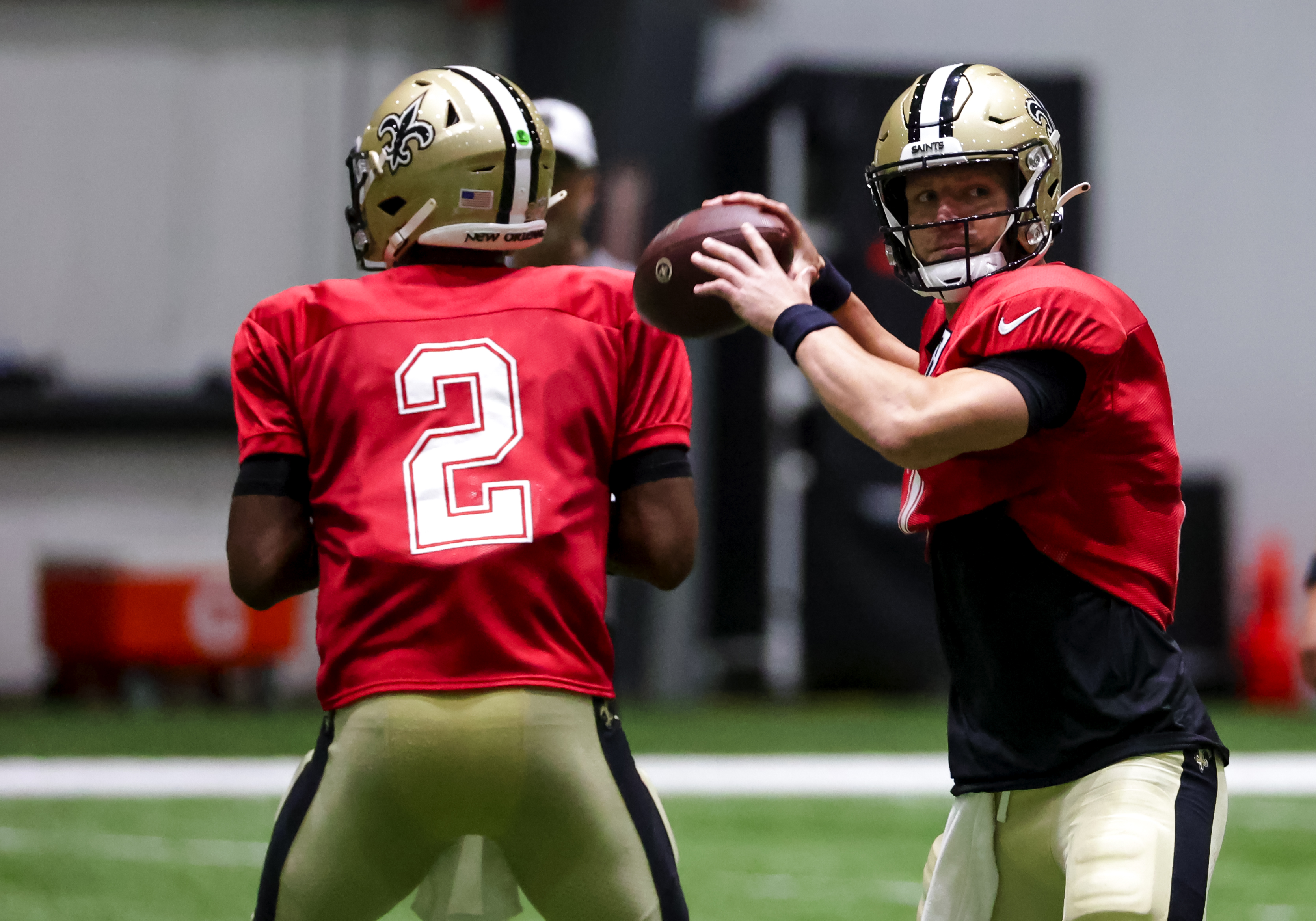 New Orleans Saints quarterback Jameis Winston (2) hands off to