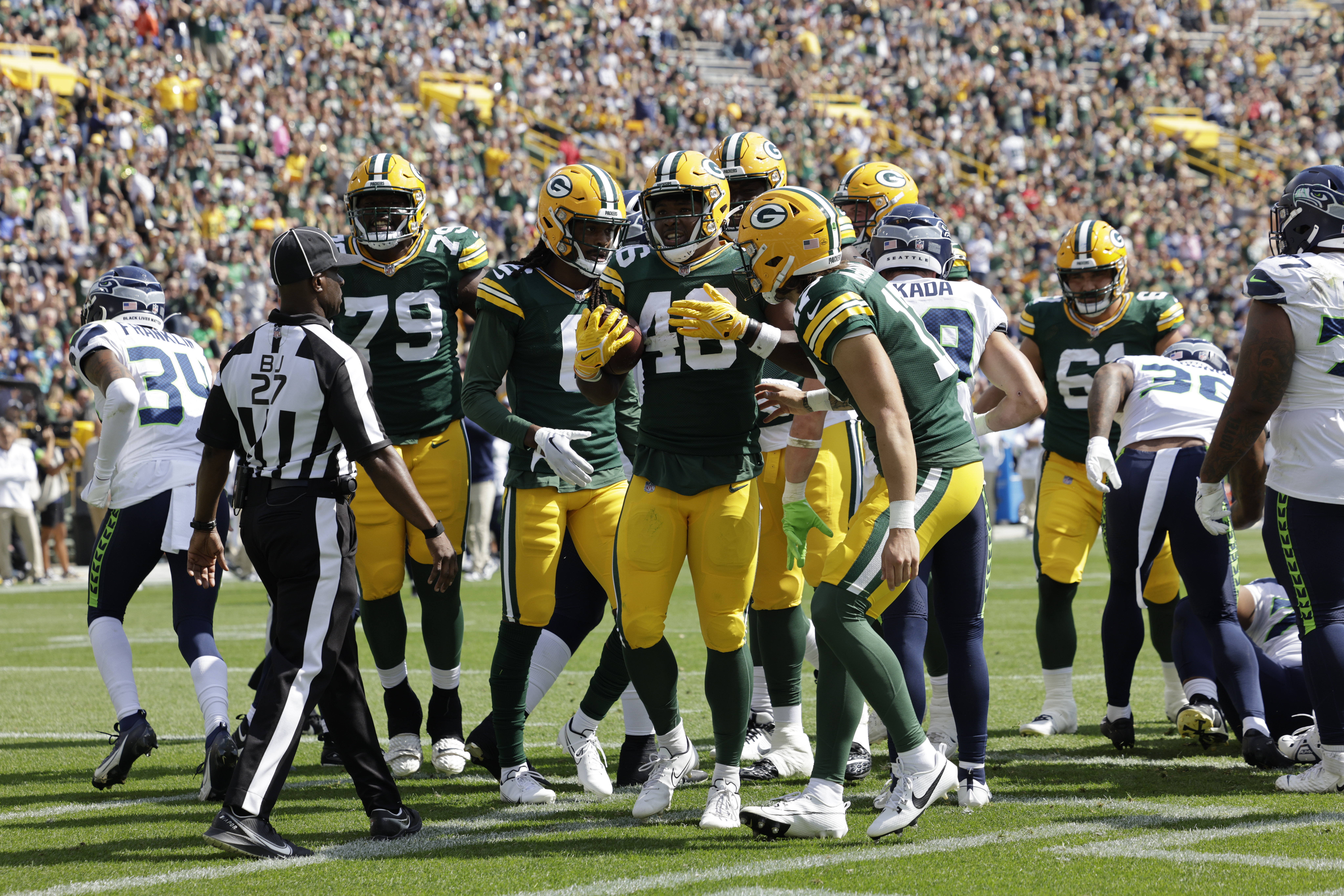 Green Bay Packers wide receiver Malik Heath (18) runs during the