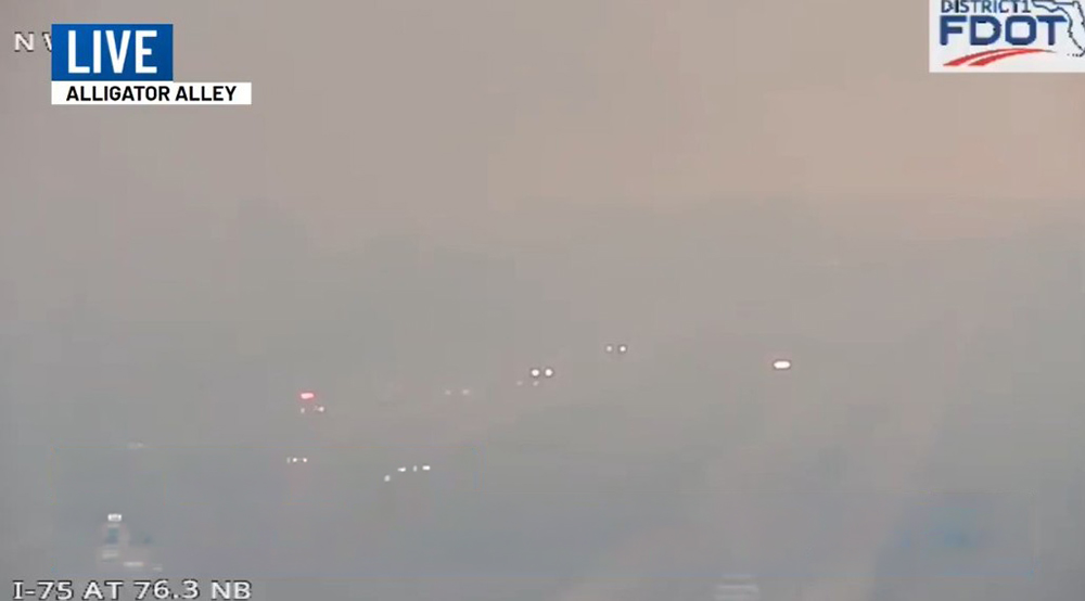 FHP monitoring wildfire smoke reducing visibility on I-75 in