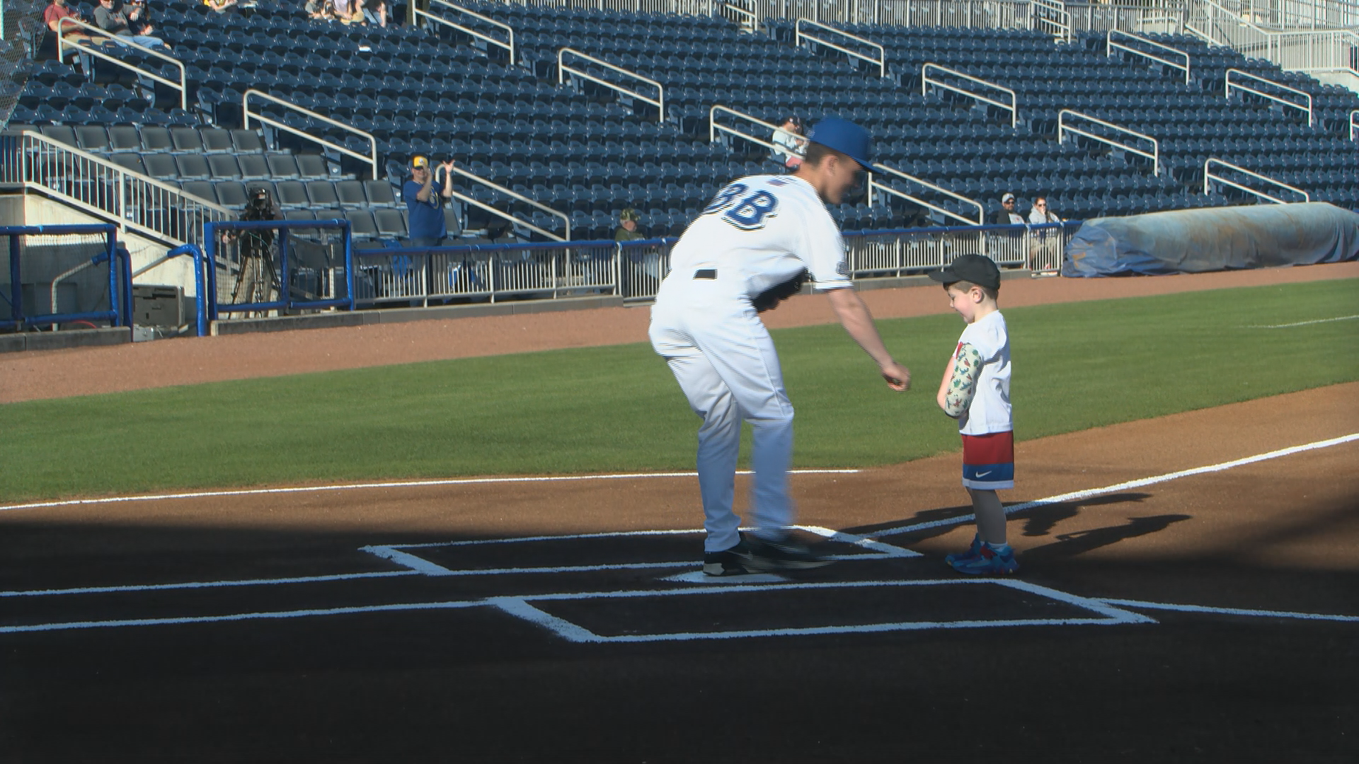 Updated: Jessica Throws Opening Pitch at a Baseball Game