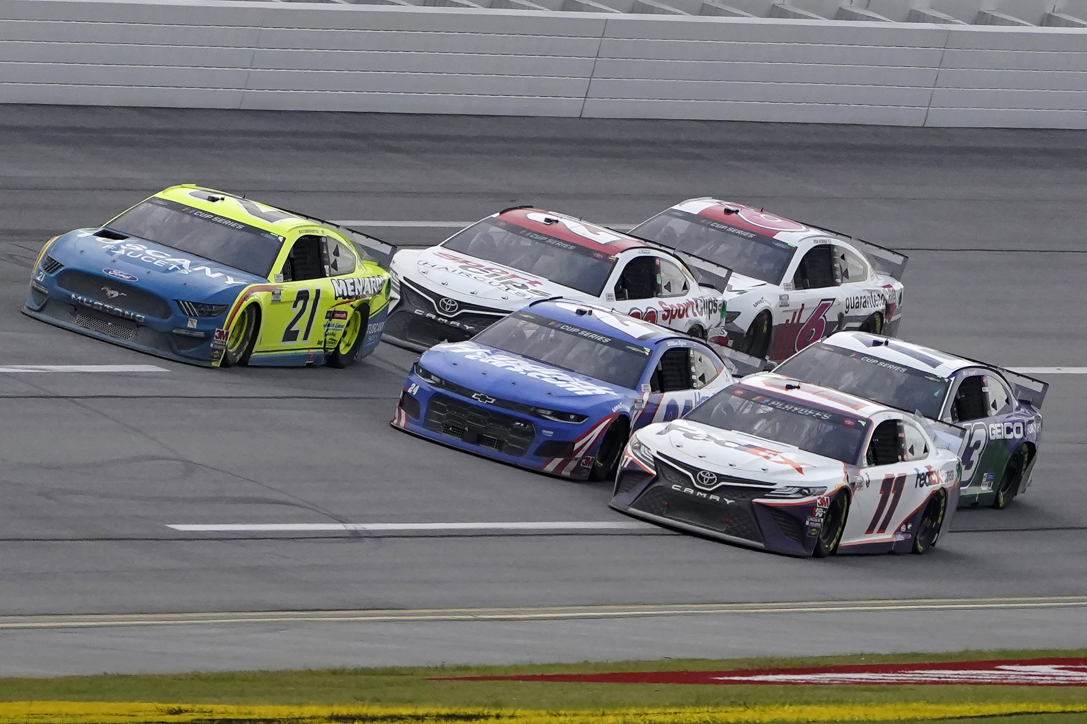 Hamlin wins in 3rd overtime of Talladega's longest race
