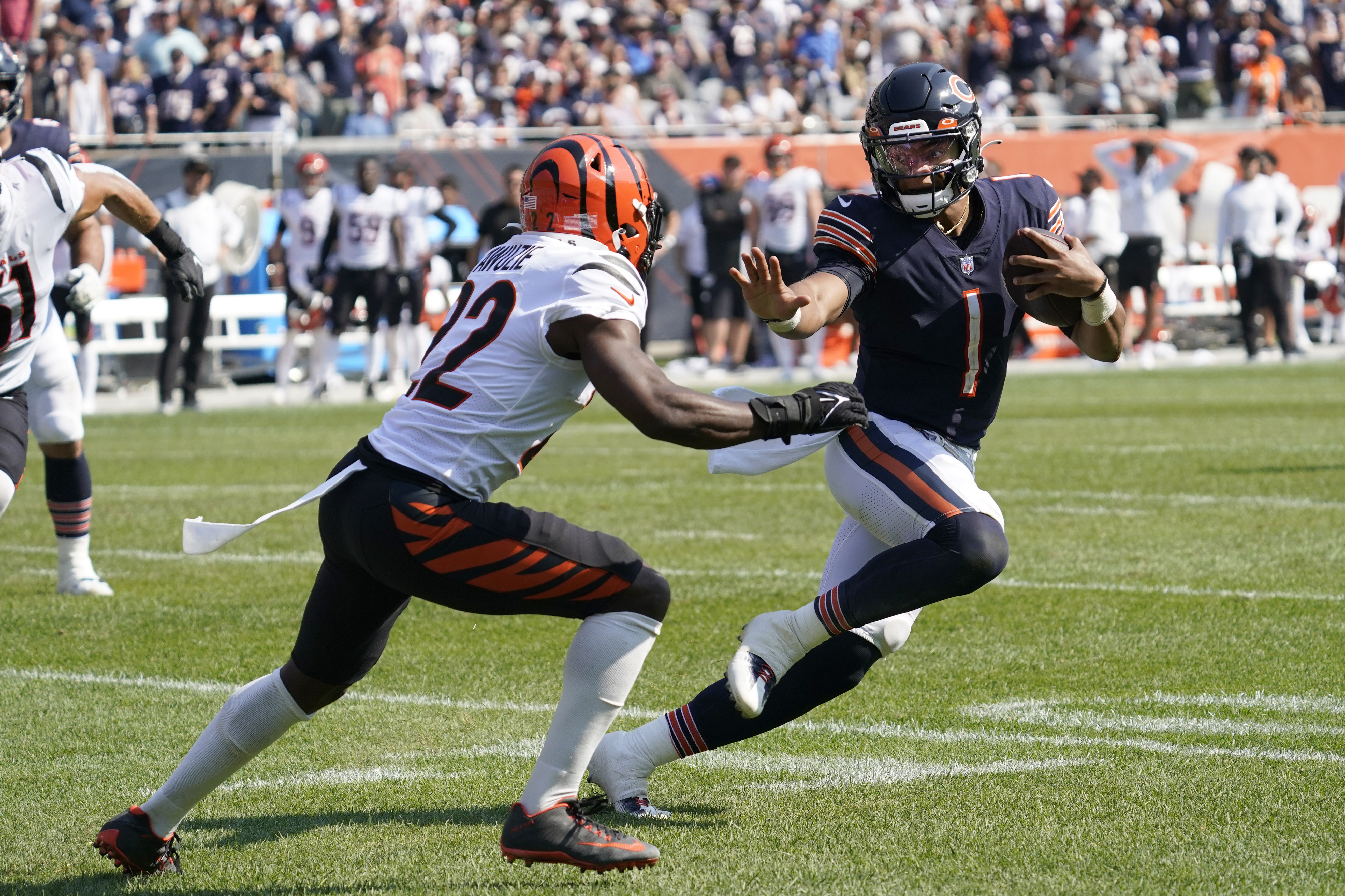 Chicago Bears quarterback Andy Dalton (14) looks to pass the ball against  the Cincinnati Bengals during the first half of an NFL football game,  Sunday, Sept. 19, 2021, in Chicago. (AP Photo/Kamil