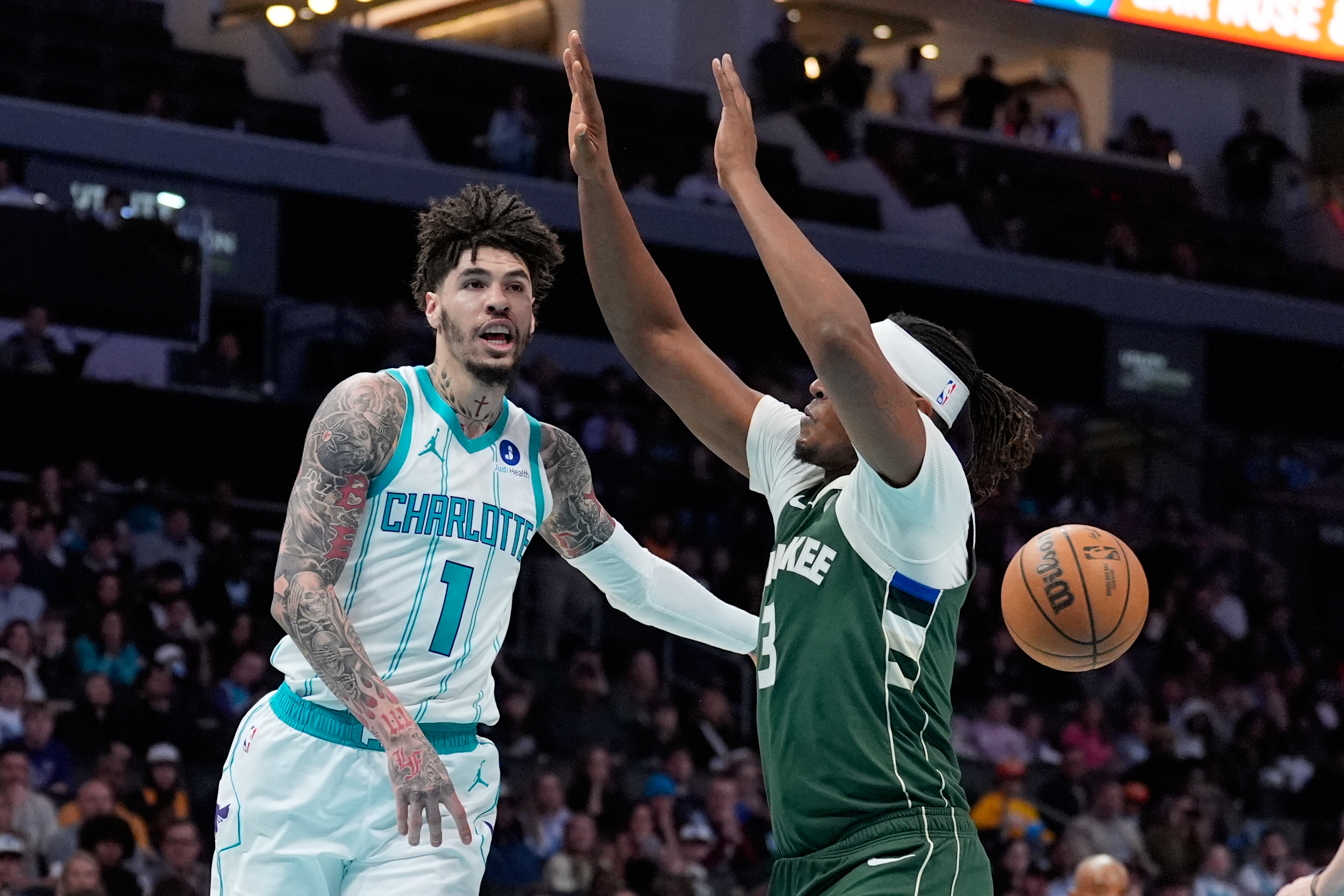 Portis, Antetokounmpo lead Bucks past Hornets 123-113 for first