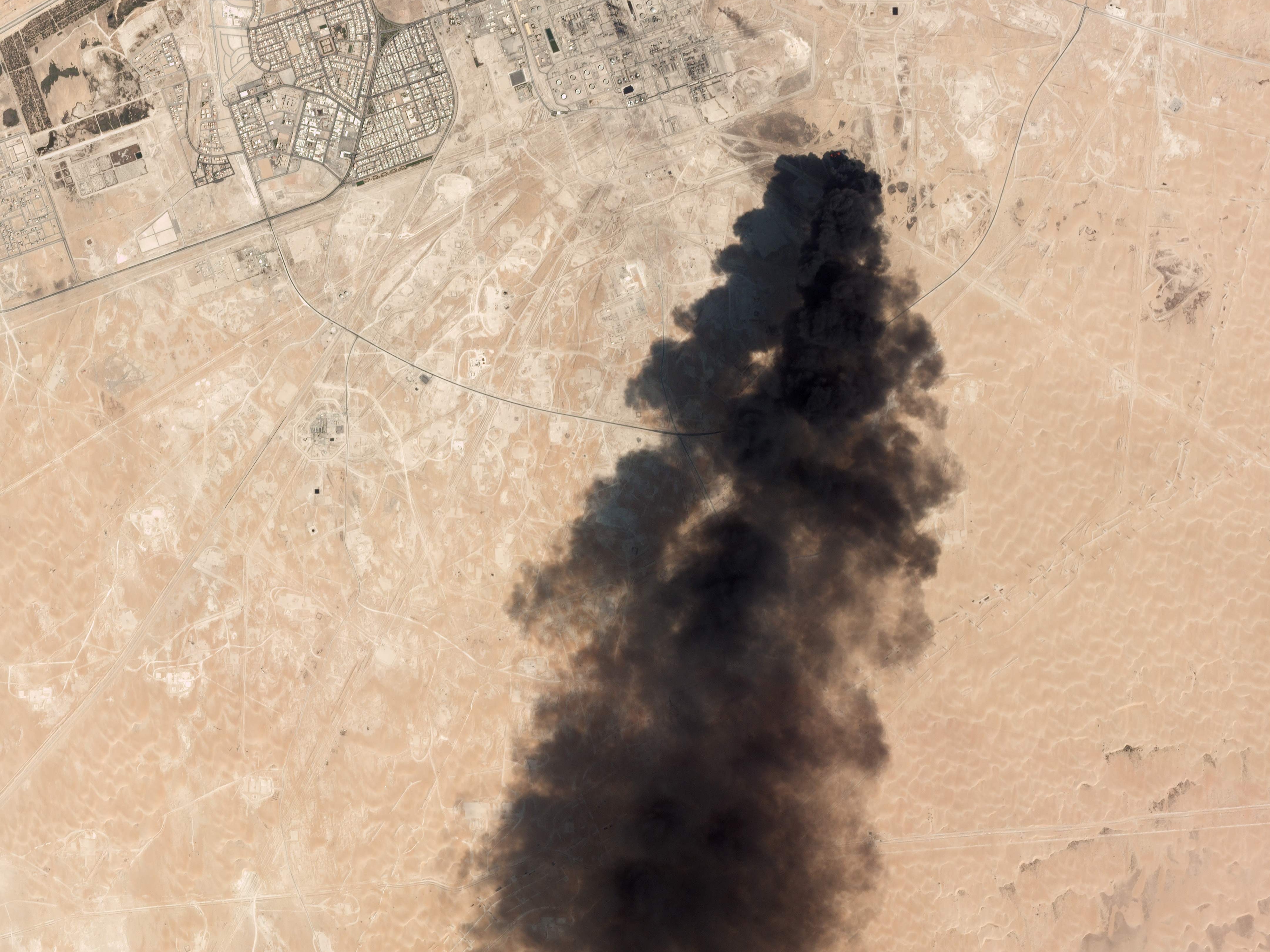 This satellite overview handout image obtained September 16, 2019 courtesy of Planet Labs Inc. shows damage to oil/gas infrastructure from weekend drone attacks at Abqaig on September 14 2019 in Saudi Arabia. - Drone attacks on key Saudi oil facilities have halved crude output from OPEC's biggest exporter, catapulting oil prices by the largest amount since the first Gulf War. The crisis has focused minds on unrest in the crude-rich Middle East, with Tehran denying Washington's charge that it was responsible.Brent oil prices leapt 20 percent on Monday to chalk up the biggest intra-day daily gain since 1991. (Photo by HO / PLANET LABS INC. / AFP) / RESTRICTED TO EDITORIAL USE - MANDATORY CREDIT "AFP PHOTO / Planet Labs Inc. / HO" - NO MARKETING NO ADVERTISING CAMPAIGNS - DISTRIBUTED AS A SERVICE TO CLIENTS == NO ARCHIVE