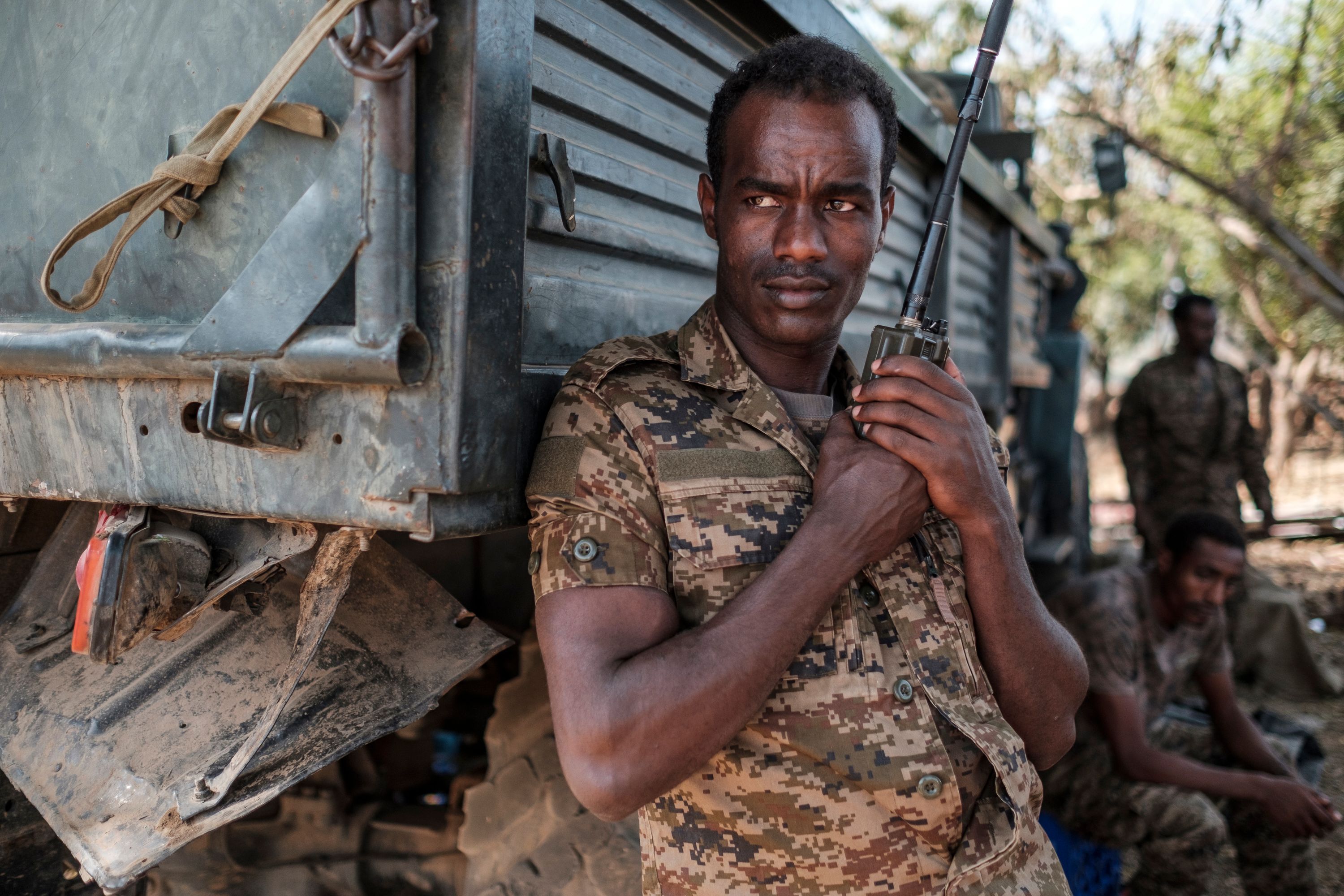 An Ethiopian soldier stands with a walkie talkie in his hand at the 5th Battalion of the Northern Command of the Ethiopian Army in Dansha, Ethiopia, on November 25, 2020. (Photo by EDUARDO SOTERAS / AFP)