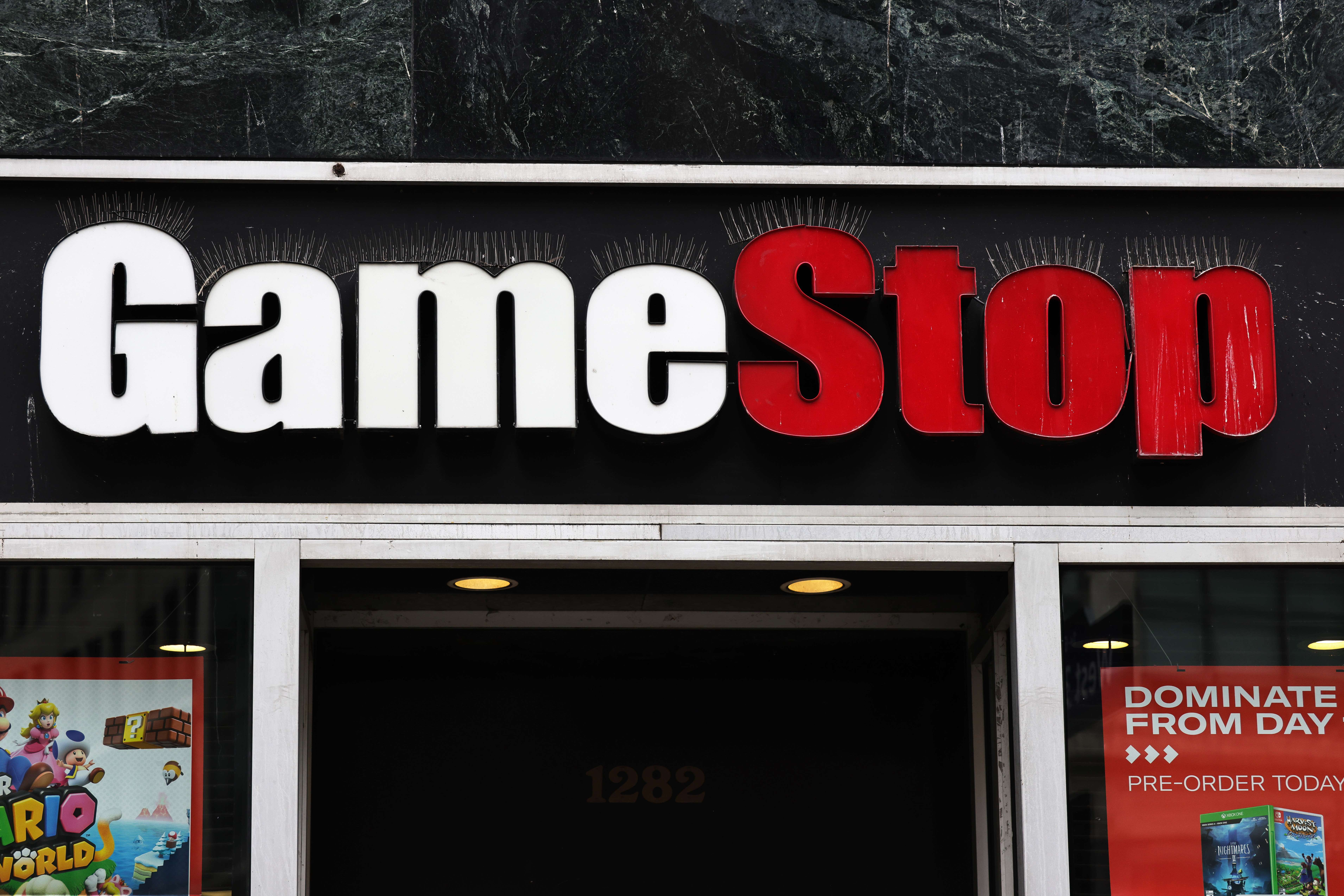 NEW YORK, NEW YORK - JANUARY 27: GameStop store signage is seen on January 27, 2021 in New York City. Stock shares of videogame retailer GameStop Corp has increased 700% in the past two weeks due to amateur investors. Michael M. Santiago/Getty Images/AFP
== FOR NEWSPAPERS, INTERNET, TELCOS & TELEVISION USE ONLY ==