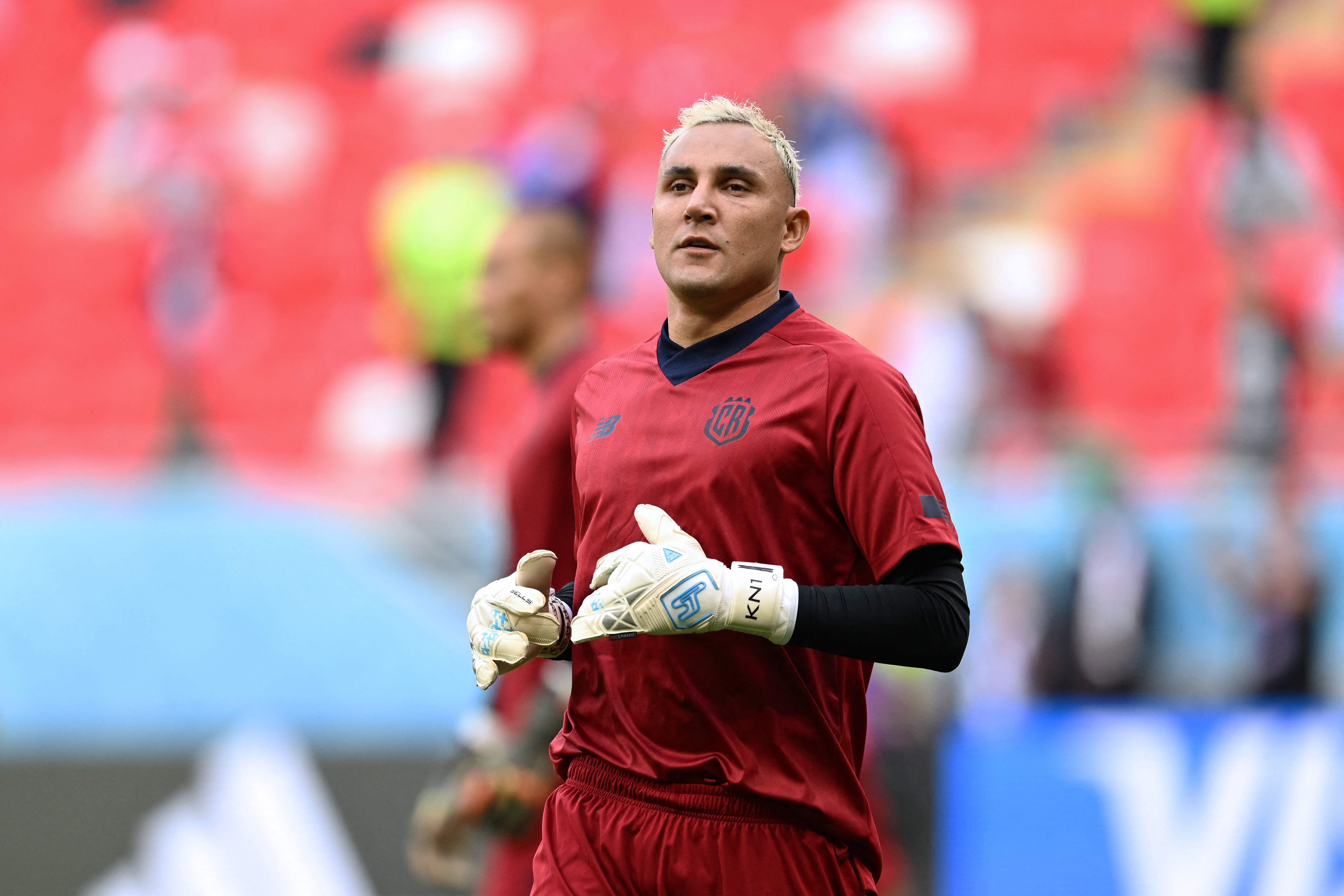 Costa Rica's goalkeeper #01 Keylor Navas warms up ahead of the Qatar 2022 World Cup Group E football match between Japan and Costa Rica at the Ahmad Bin Ali Stadium in Al-Rayyan, west of Doha on November 27, 2022. (Photo by Raul ARBOLEDA / AFP)
