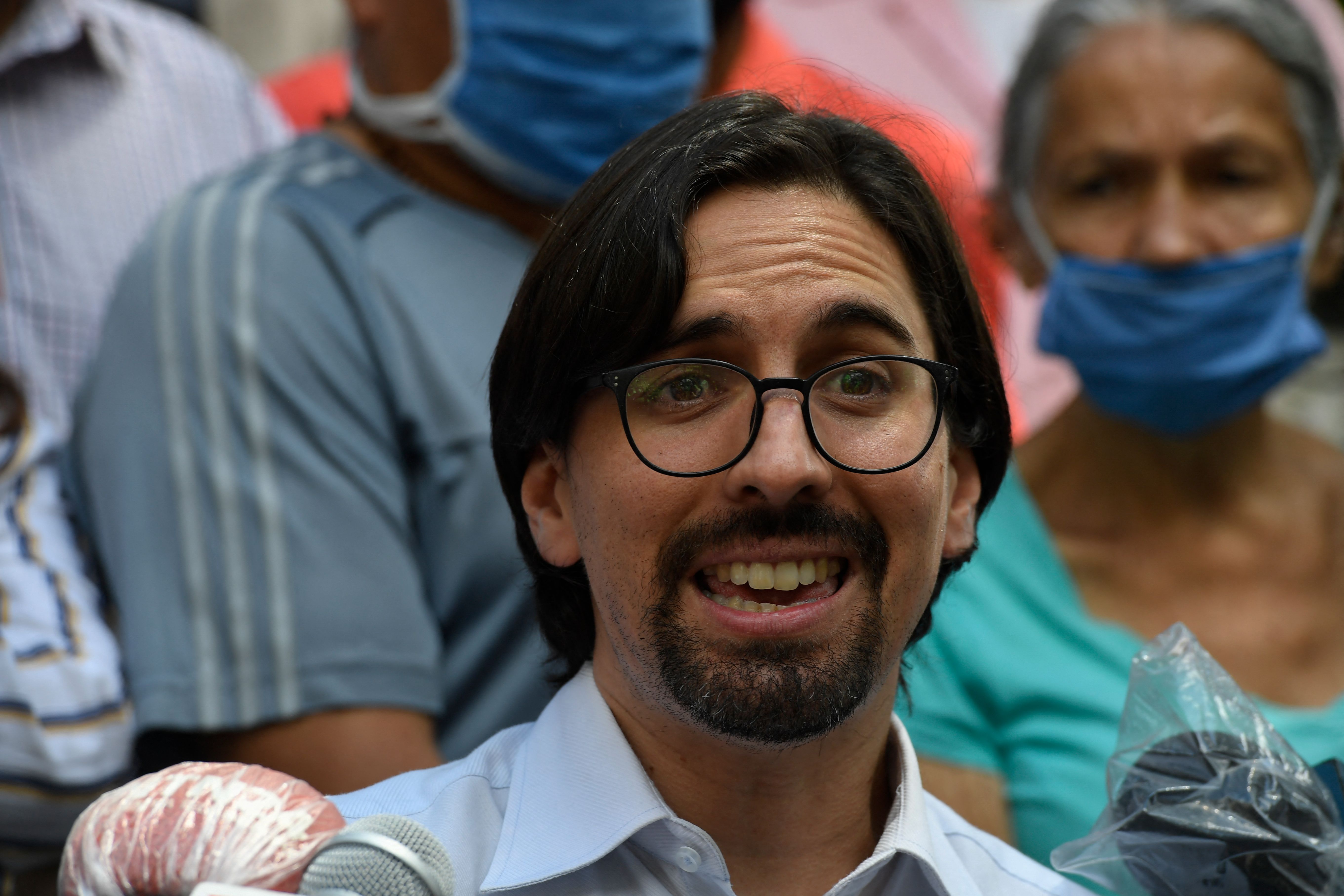 (FILES) In this file photo taken on September 09, 2020, opposition lawmaker Freddy Guevara speaks to the press after leaving the Chilean embassy where he had taken refuge in 2017, in Caracas, days after Venezuela President Nicolas Maduro pardoned more than 100 lawmakers and associates of opposition leader Juan Guaido. - Guevara was detained on July 12, 2021 and transferred to the headquarters of the intelligence services, Guaido's office said. (Photo by Federico PARRA / AFP)