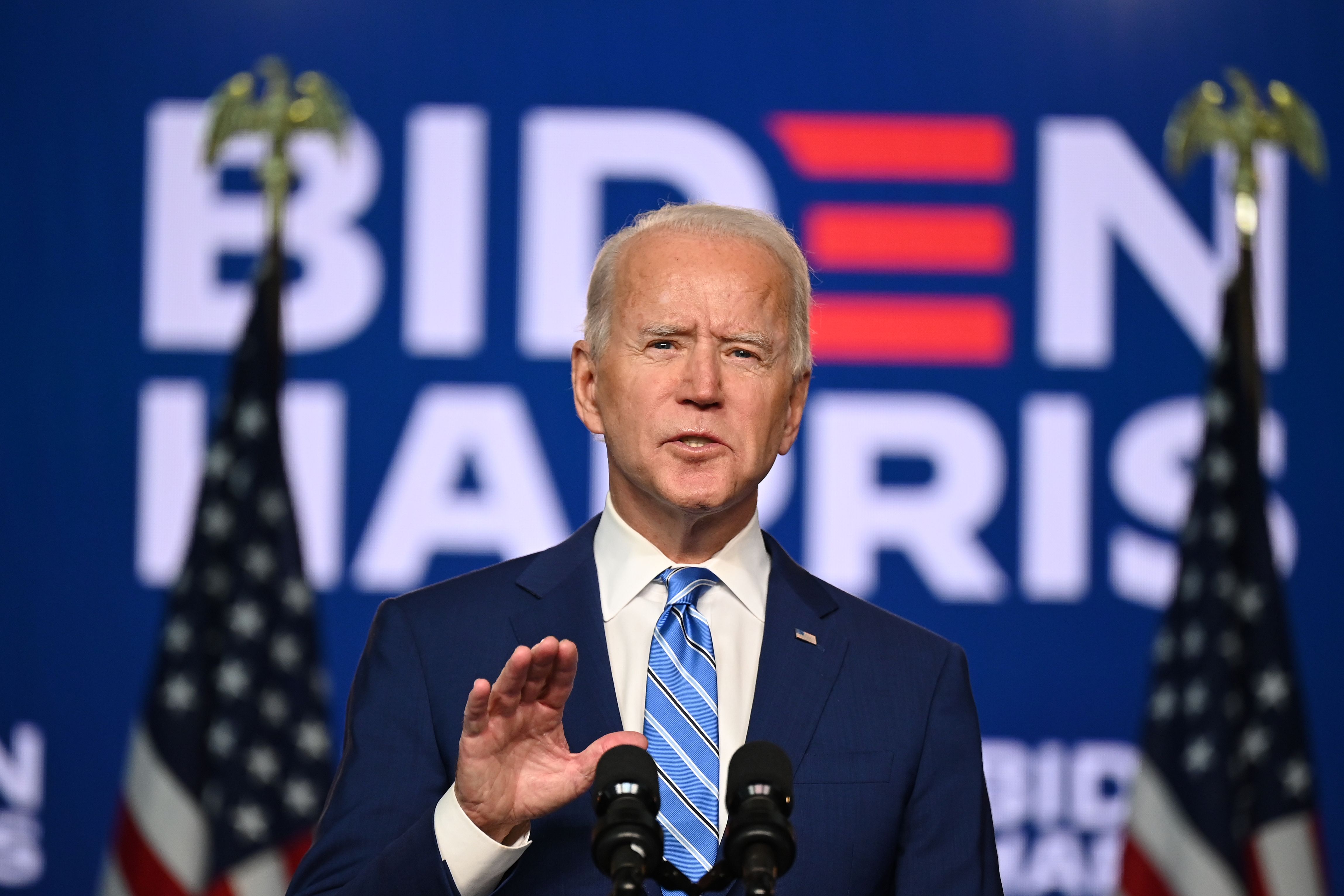TOPSHOT - Democratic Presidential candidate Joe Biden speaks at the Chase Center in Wilmington, Delaware, on November 4, 2020. - President Donald Trump and Democratic challenger Joe Biden are squaring off for what could be a legal battle for the White House, running neck-and-neck in the electoral vote count, and several battleground states still in play on November 4. (Photo by JIM WATSON / AFP)