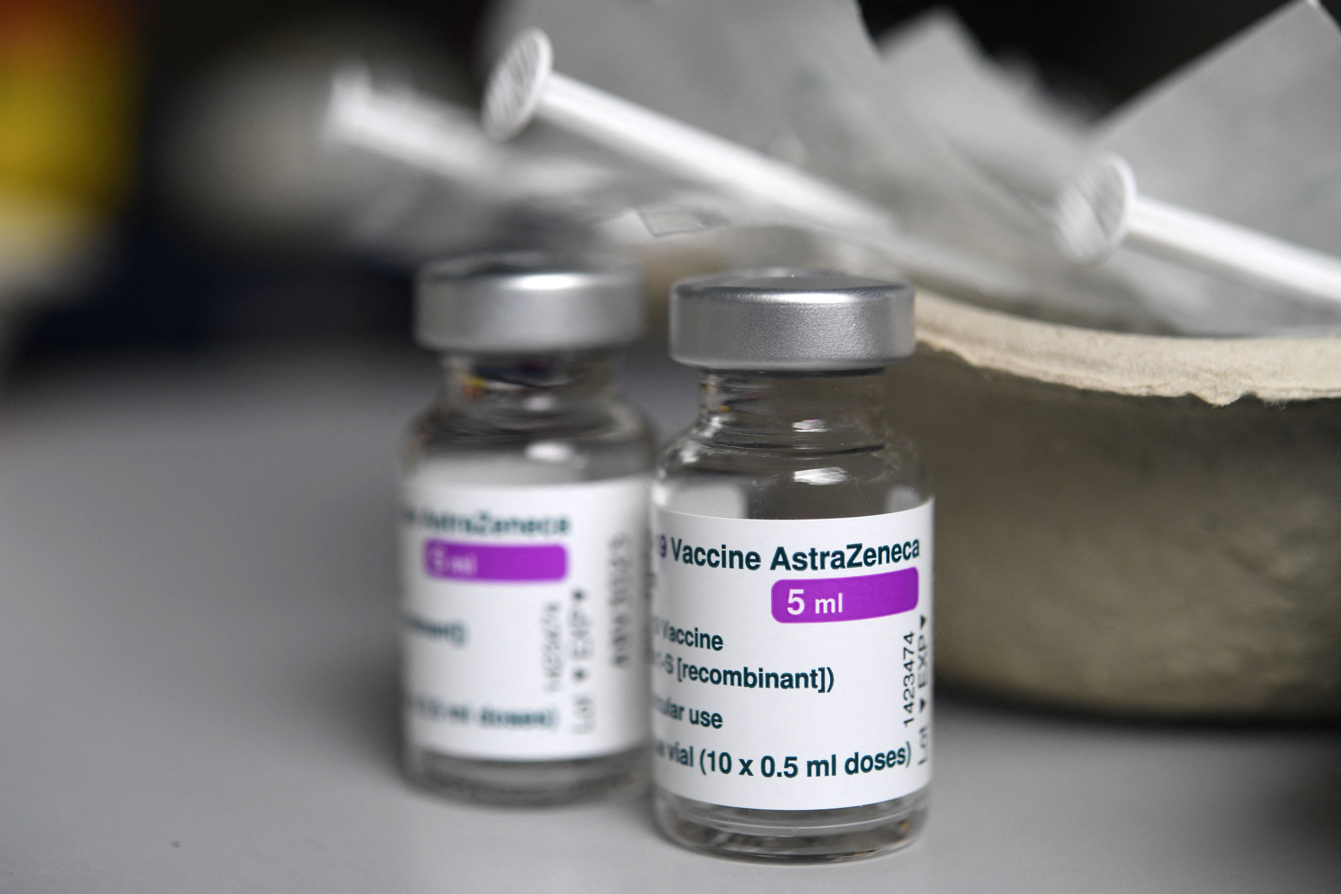 (FILES) In this file photo taken on March 12, 2021 shows empty vials of the Astra-Zeneca Covid-19 vaccine at a vaccination center at the UBO (Universite Bretagne Occidentale) in Brest, western France. - The Netherlands suspends the use of AstraZeneca vaccine on March 14, 2021. (Photo by Fred TANNEAU / AFP)