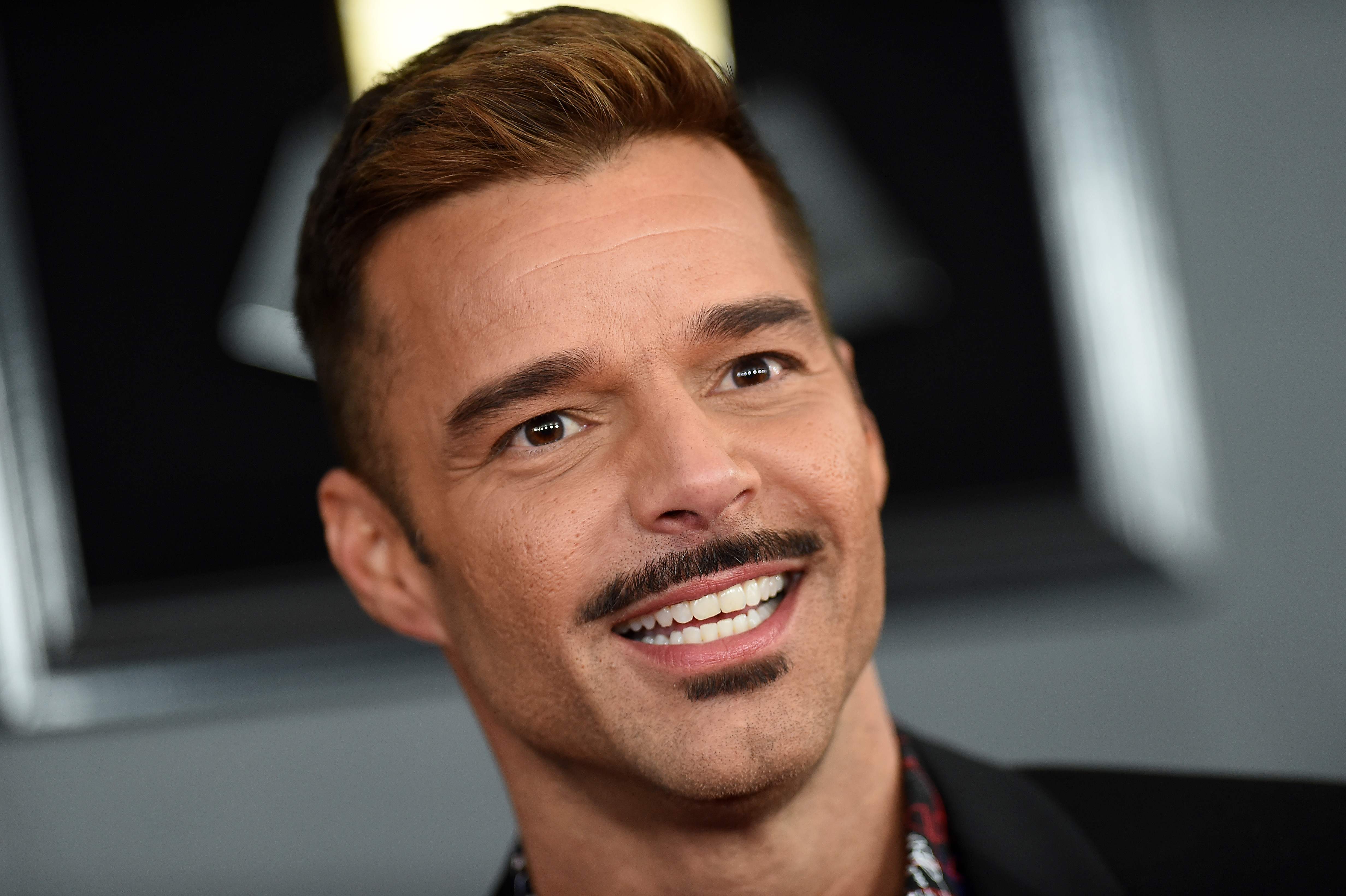 Puerto Rican singer Ricky Martin arrives for the 61st Annual Grammy Awards on February 10, 2019, in Los Angeles. (Photo by VALERIE MACON / AFP)