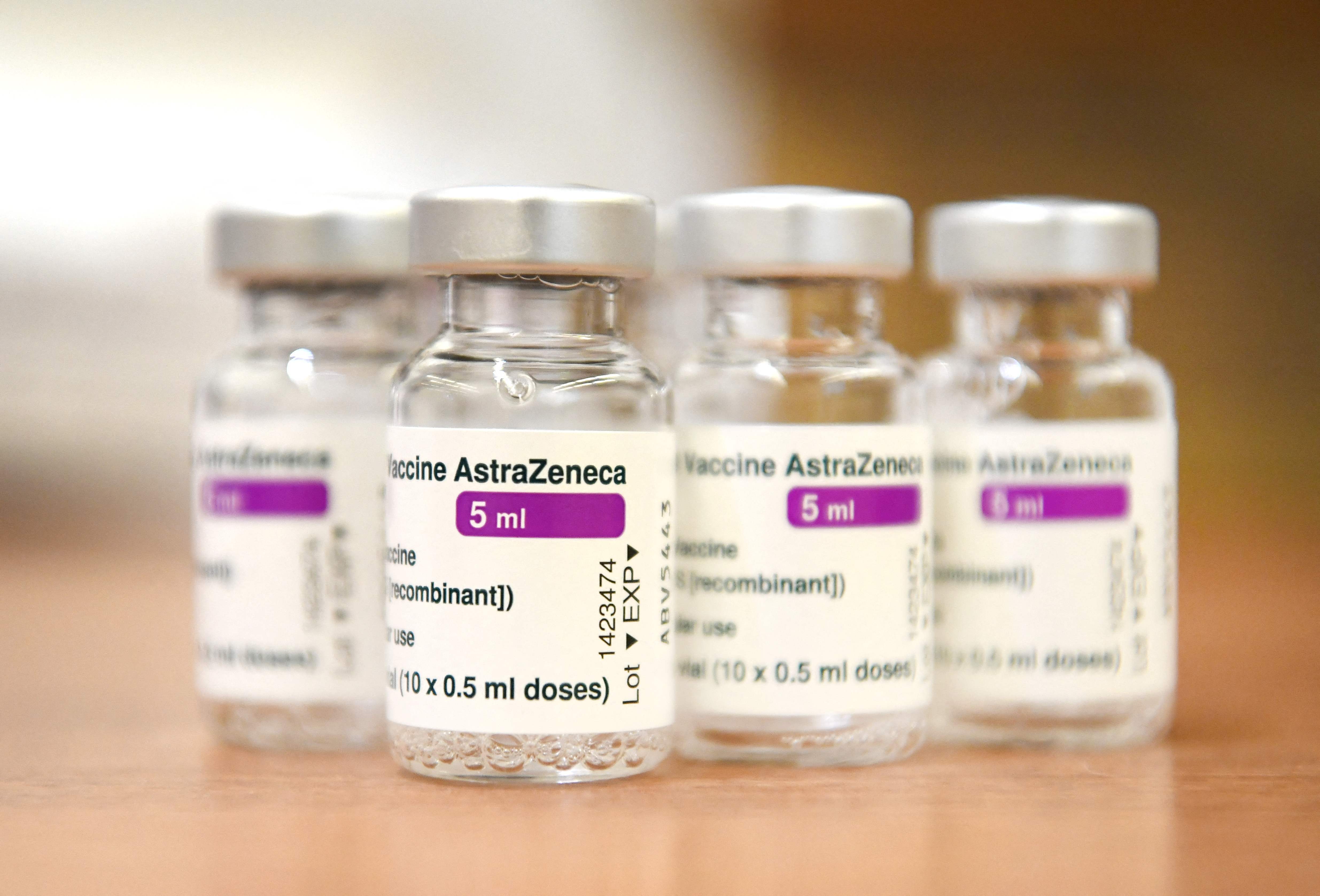 A picture taken on March 20, 2021 shows empty vials of AstraZeneca vaccines against the Covid-19 in Ede, where the vaccination campaign with the AstraZeneca vaccine resumes. (Photo by Piroschka van de Wouw / ANP / AFP) / Netherlands OUT