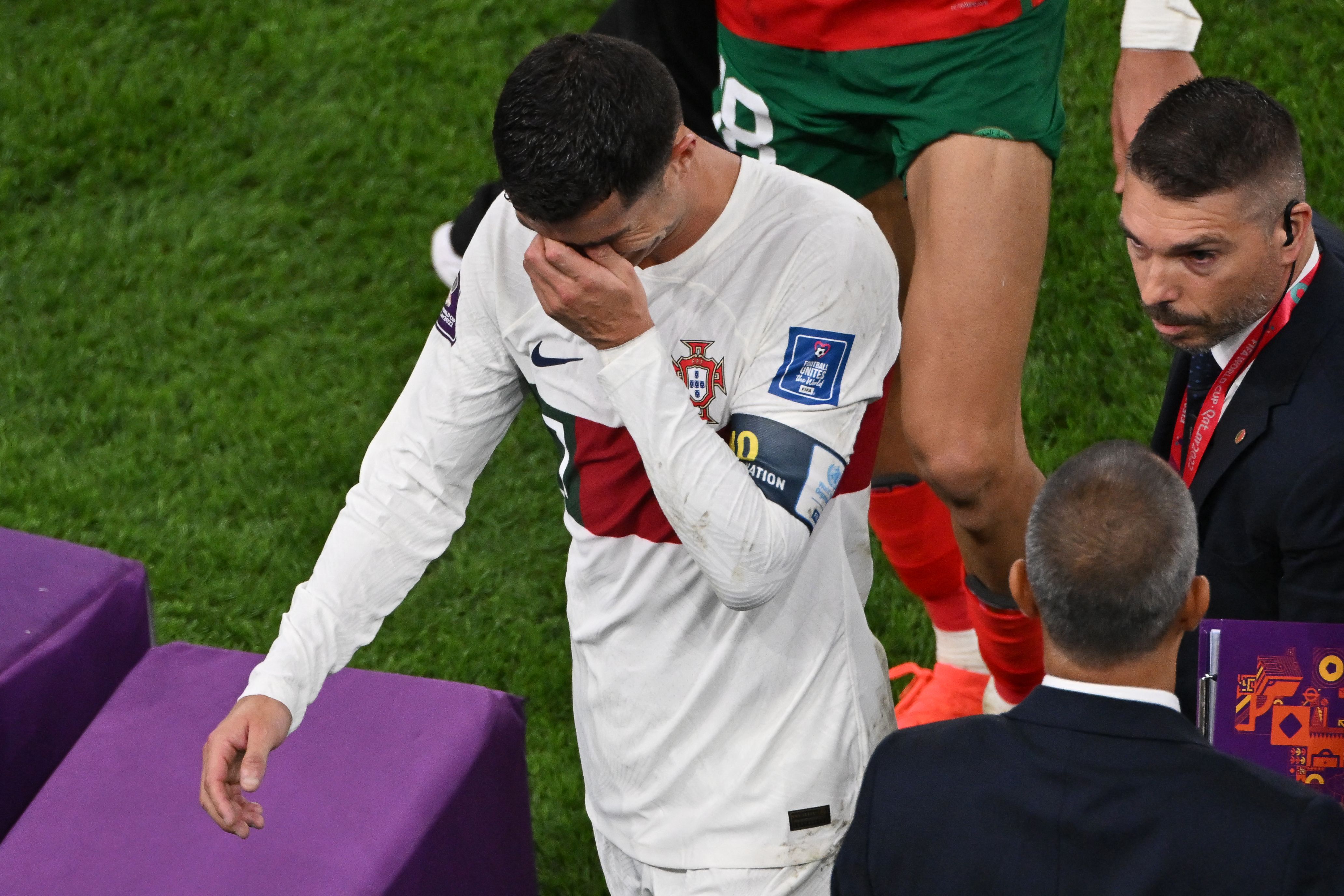 Portugal's forward #07 Cristiano Ronaldo leaves the field after losing to Morocco 1-0 in the Qatar 2022 World Cup quarter-final football match between Morocco and Portugal at the Al-Thumama Stadium in Doha on December 10, 2022. (Photo by NELSON ALMEIDA / AFP)