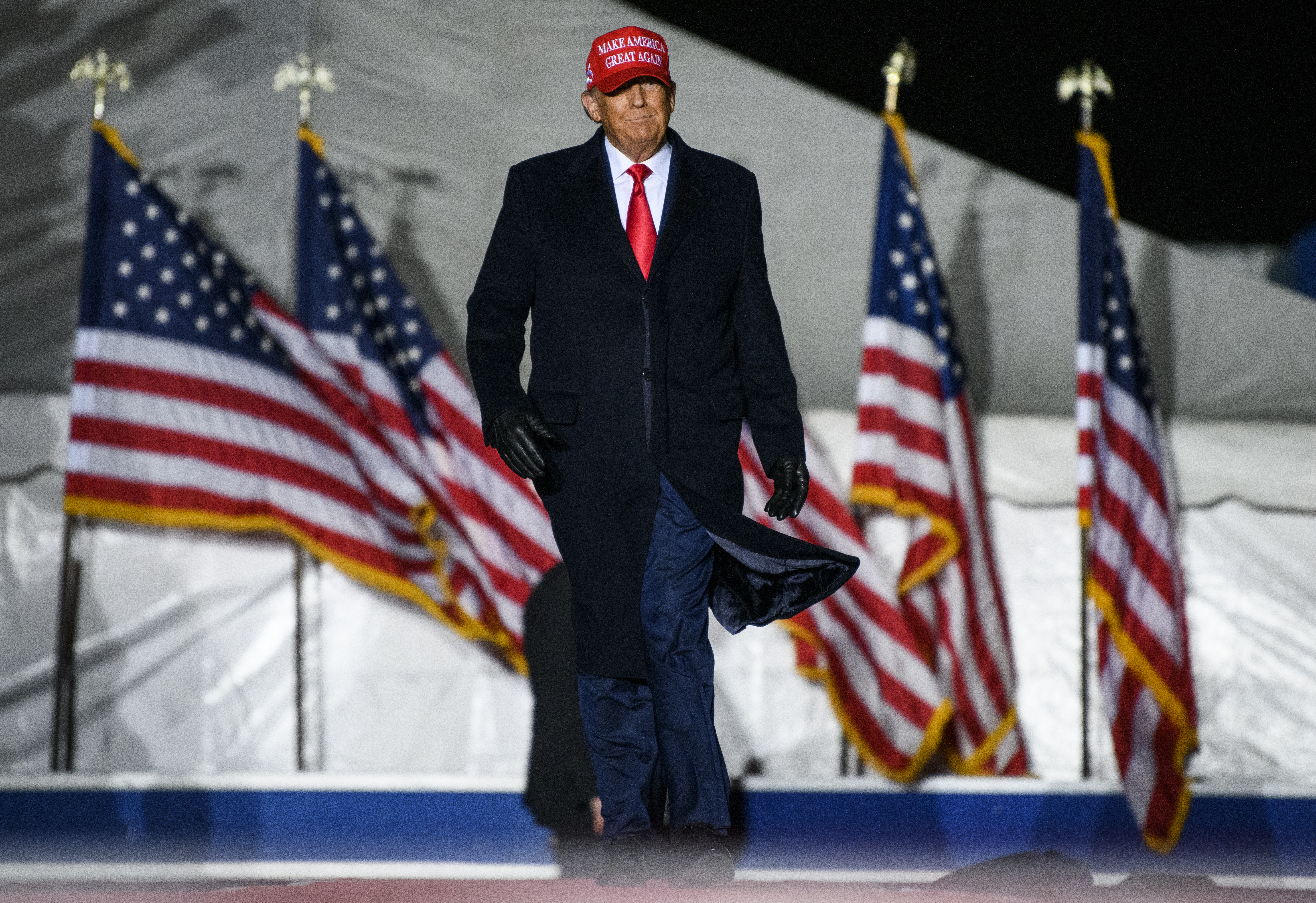 SIOUX CITY, IA - NOVEMBER 03: Former U.S. President Donald Trump arrives during a campaign event at Sioux Gateway Airport on November 3, 2022 in Sioux City, Iowa. Trump held the rally to support for Iowa GOP candidates ahead of the state's midterm election on November 8th. Stephen Maturen/Getty Images/AFP (Photo by Stephen Maturen / GETTY IMAGES NORTH AMERICA / Getty Images via AFP)