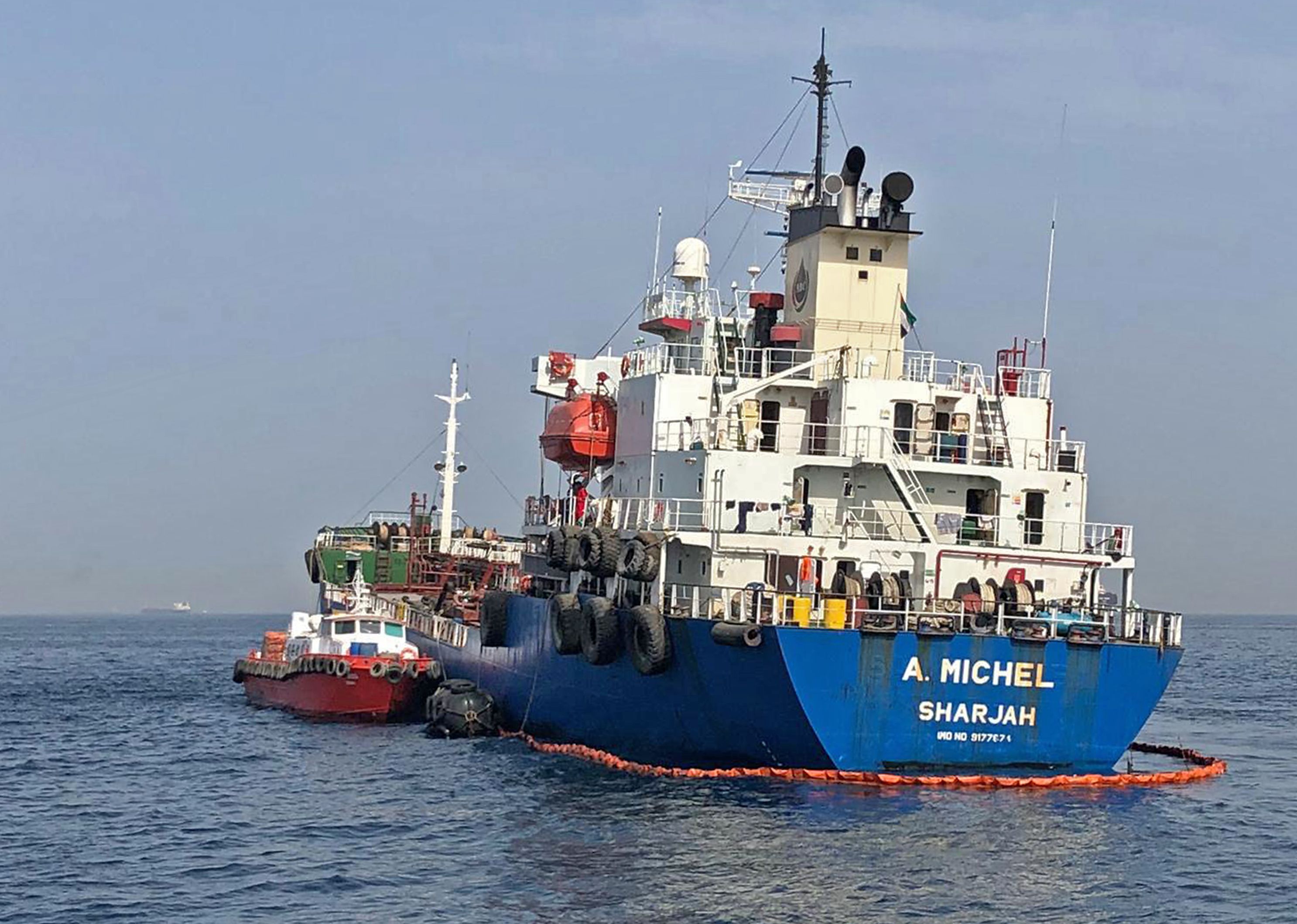 A picture taken on May 13, 2019 off the coast of the Gulf emirate of Fujairah shows the A. Michel tanker under the flag of the United Arab Emirates, one of the four tankers damaged in alleged "sabotage attacks" in the Gulf the previous day. - The United Arab Emirates said on May 12, 2019 that four commercial vessels of various nationalities had been targeted by acts of sabotage off the Emirati port of Fujairah. (Photo by HANDOUT / various sources / AFP) / === RESTRICTED TO EDITORIAL USE - MANDATORY CREDIT "AFP PHOTO / Emirati National Media Council" - NO MARKETING NO ADVERTISING CAMPAIGNS - DISTRIBUTED AS A SERVICE TO CLIENTS ===