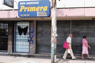 Vendedor muere en asalto a tienda de ropa americana La Naci n