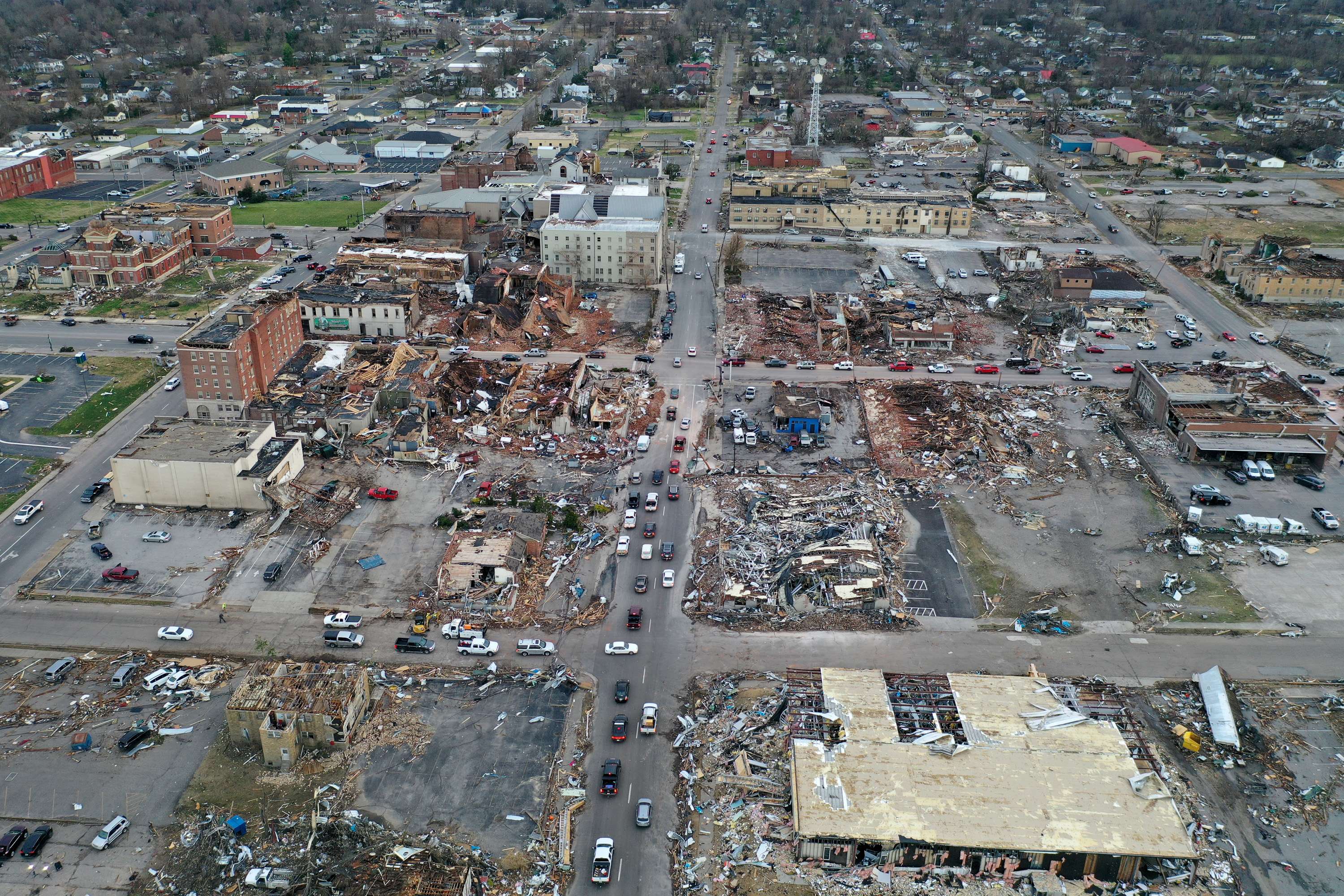 MAYFIELD, KENTUCKY - DECEMBER 11: An aerial view of homes and business destroyed by a tornado on December 11, 2021 in Mayfield, Kentucky. Multiple tornadoes touched down in several midwestern states late Friday evening causing widespread destruction and leaving an estimated 70-plus people dead. Scott Olson/Getty Images/AFP
== FOR NEWSPAPERS, INTERNET, TELCOS & TELEVISION USE ONLY ==