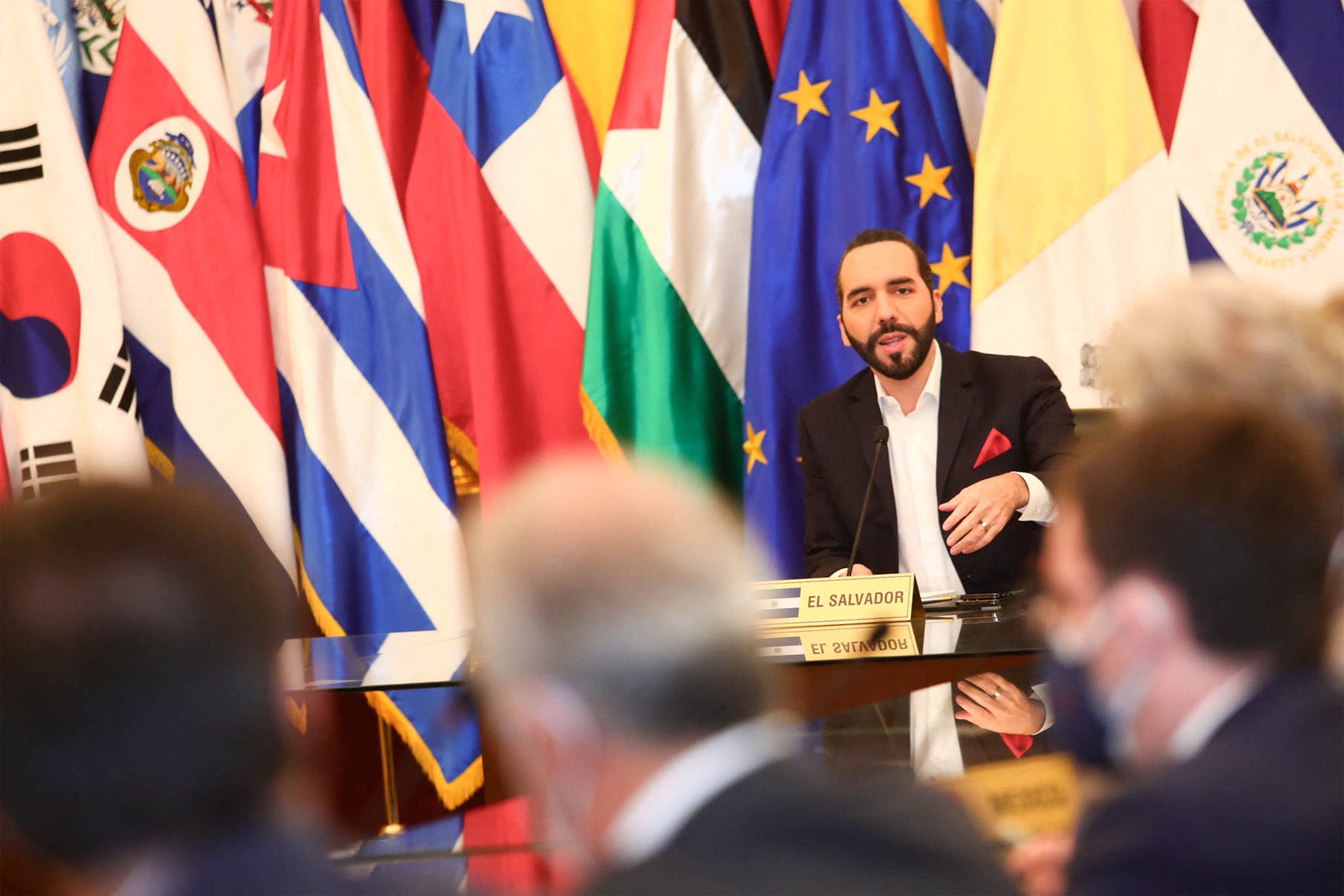 This handout provided by the El Salvador Presidential Press office and taken on May 3, 2021 shows El Salvadoran President Nayib Bukele talks during a meeting with ambassadors accredited in his country at the National Palace in San Salvador. - Bukele summoned the ambassadors accredited in his country to complain about the international condemnation against his country, after the pro-government Congress dismissed supreme magistrates and the Attorney General. (Photo by - / EL SALVADOR'S PRESIDENCY PRESS OFFICE / AFP) / RESTRICTED TO EDITORIAL USE - MANDATORY CREDIT "AFP PHOTO / EL SALVADOR'S PRESIDENCY PRESS OFFICE " - NO MARKETING - NO ADVERTISING CAMPAIGNS - DISTRIBUTED AS A SERVICE TO CLIENTS