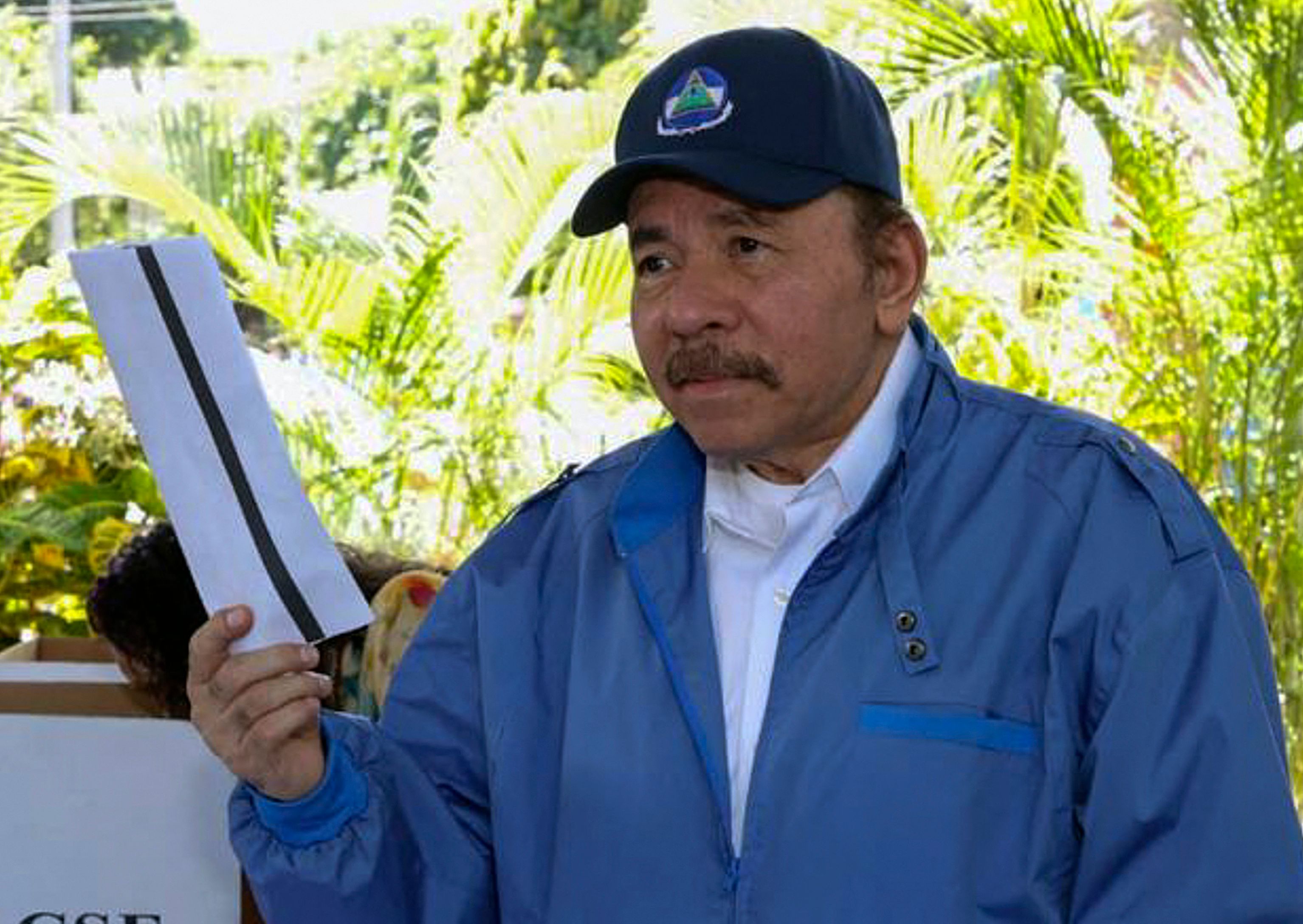 Handout picture released by Nicaragua's presidency press office of Nicaragua's President and presidential candidate Daniel Ortega ready to cast his vote during the general election, in Managua, Nicaragua on November 07, 2021. - Under ring-of-steel security, Nicaragua opened its polls for presidential elections dismissed as a "sham" by the international community, with all viable challengers to long-term leader Daniel Ortega locked up or in exile. (Photo by Cesar PEREZ / Nicaraguan Presidency / AFP) / RESTRICTED TO EDITORIAL USE - MANDATORY CREDIT AFP PHOTO / PRESIDENCIA NICARAGUA - Cesar PEREZ - NO MARKETING - NO ADVERTISING CAMPAIGNS - DISTRIBUTED AS A SERVICE TO CLIENTS
