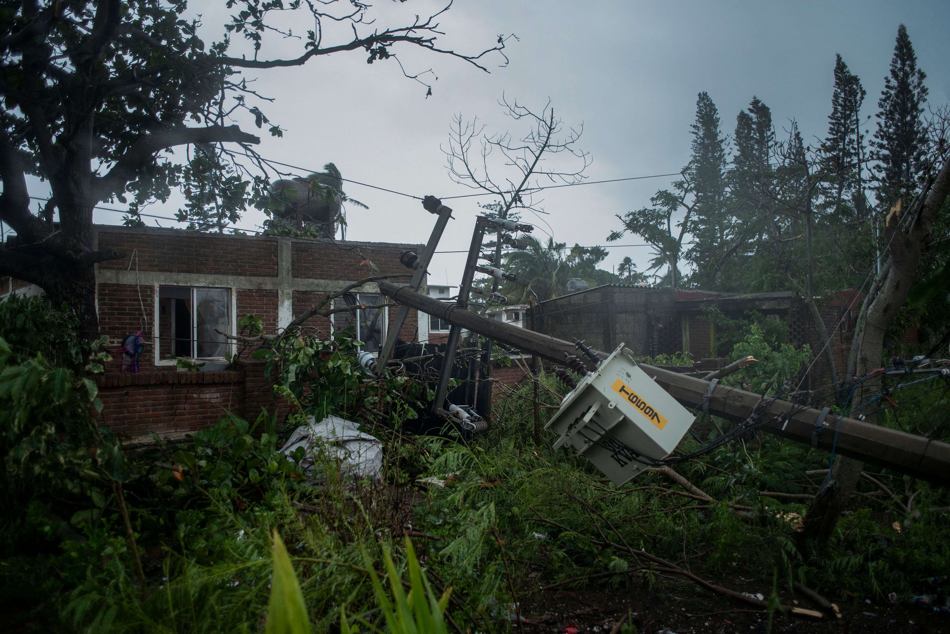 View of a construction damaged by the landfall of Hurricane Grace in Tecolutla, Veracruz, Mexico, on August 21, 2021. - Hurricane Grace lashed eastern Mexico with heavy rain and strong wind on Saturday, causing flooding, power blackouts and damage to homes as it gradually lost strength over the mountainous interior. (Photo by VICTORIA RAZO / AFP)