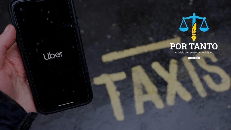 en la imagen alguien sosteniendo un teléfono que dice "Uber"