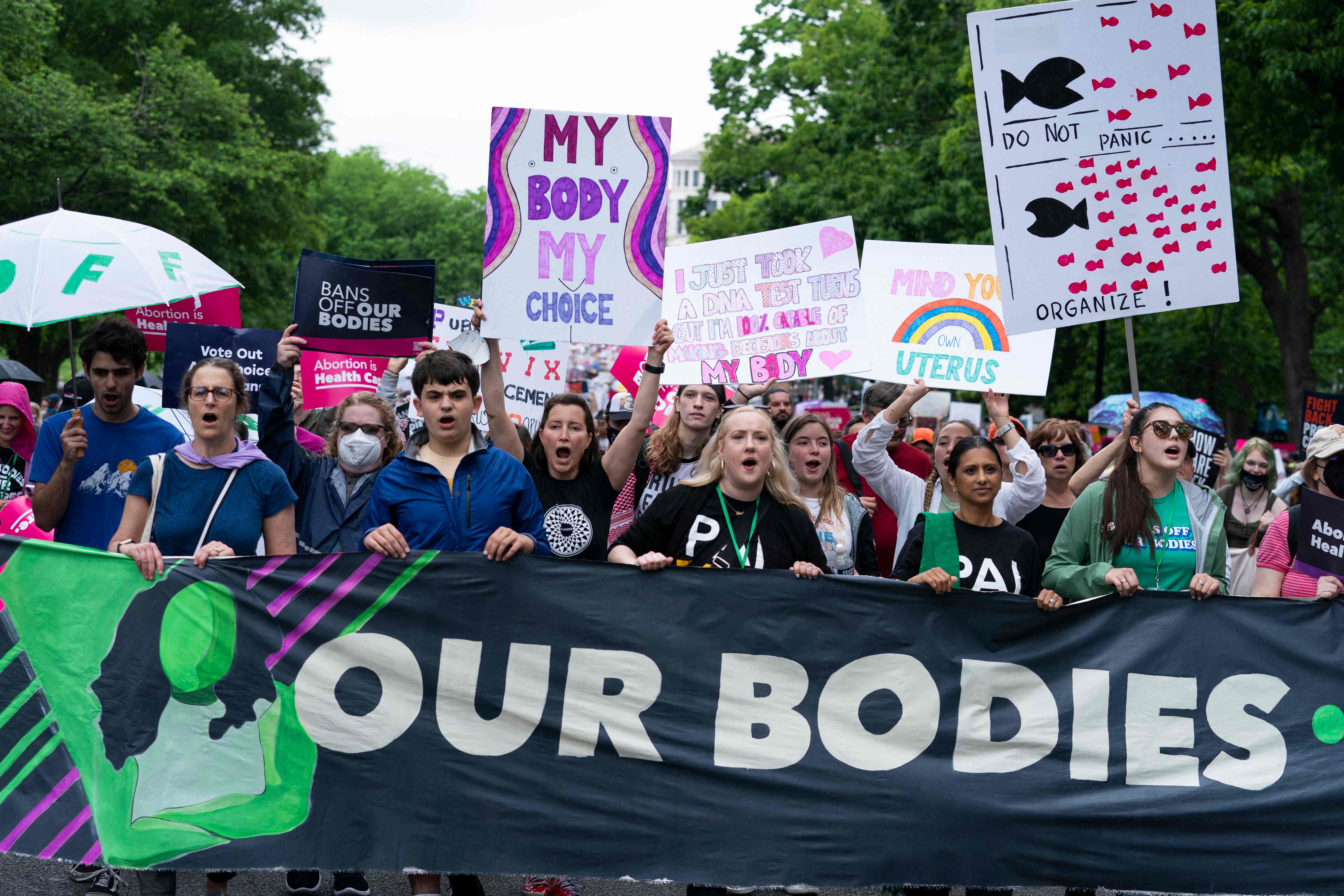 Activists take part in the �The Bans Off Our Bodies� march for abortion access, at the Washington Monument in Washington, DC on May 14, 2022. - Thousands of activists are participating in a national day of action calling for safe and legal access to abortion. The nationwide demonstrations are a response to leaked draft opinion showing the US Supreme Court's conservative majority is considering overturning Roe v. Wade, the 1973 ruling guaranteeing abortion access. (Photo by Jose Luis Magana / AFP)