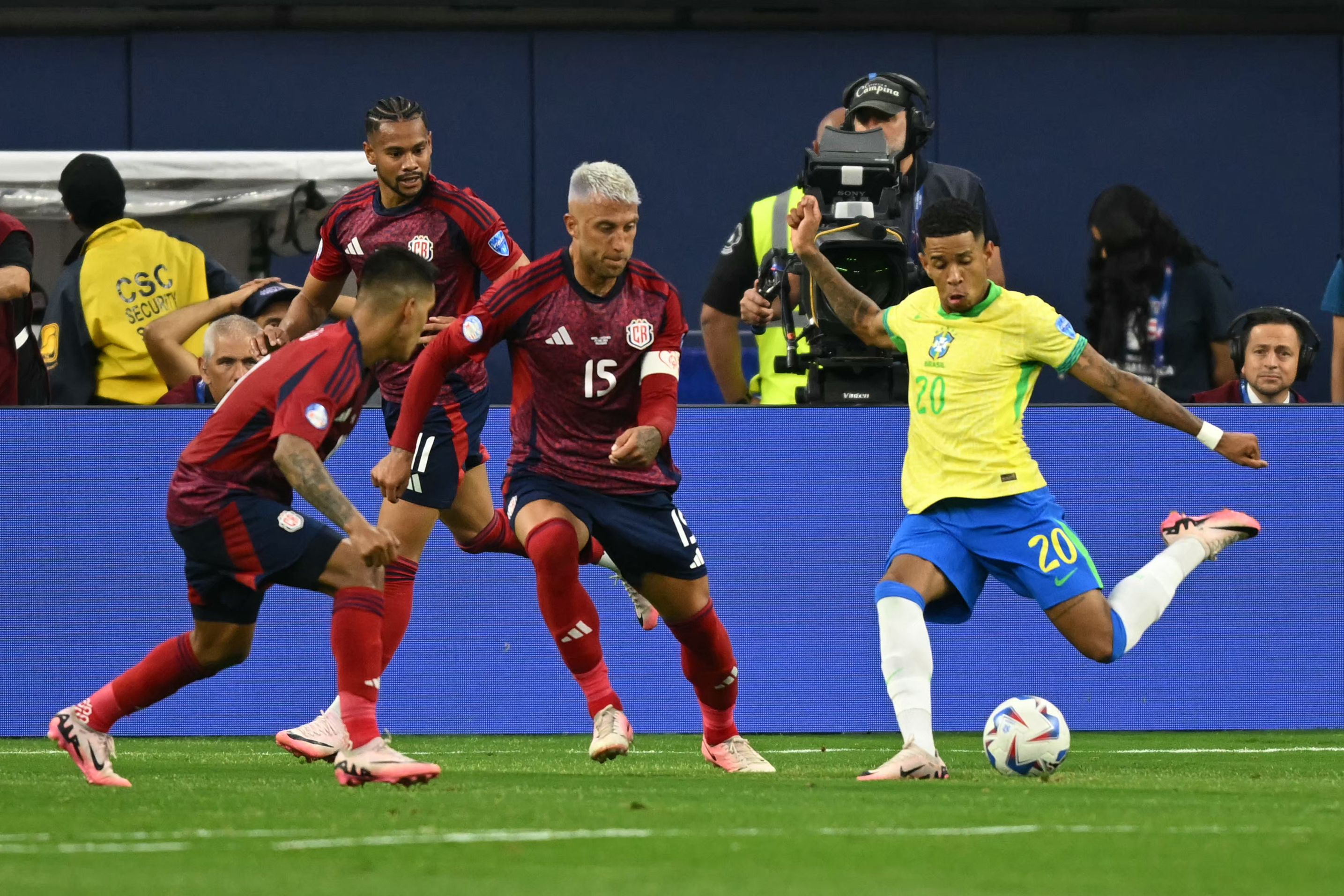 Brazil's forward #20 Savinho fights for the ball wih Costa Rica's defender #15 Francisco Calvo during the Conmebol 2024 Copa America tournament group D football match between Brazil and Costa Rica at SoFi Stadium in Inglewood, California on June 24, 2024. (Photo by Patrick T. Fallon / AFP)